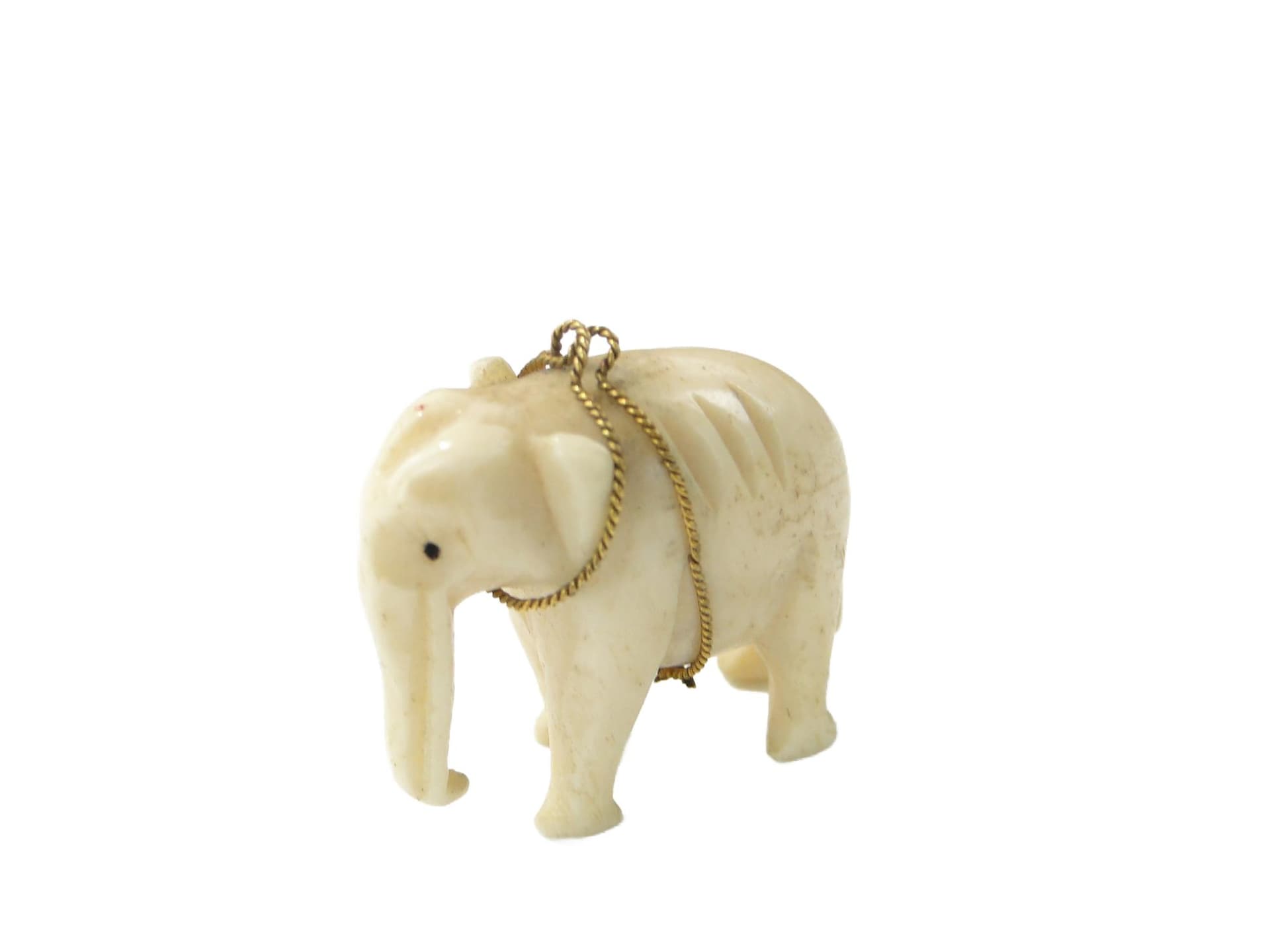 Colonial Elephant Pendant, beige bone, gold-plated wire, India/United Kingdom, 19th c.