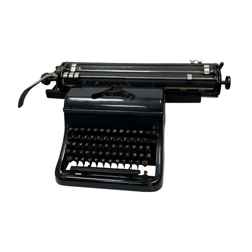 Typewriter Olympia M10, black metal, Germany, 1930s.