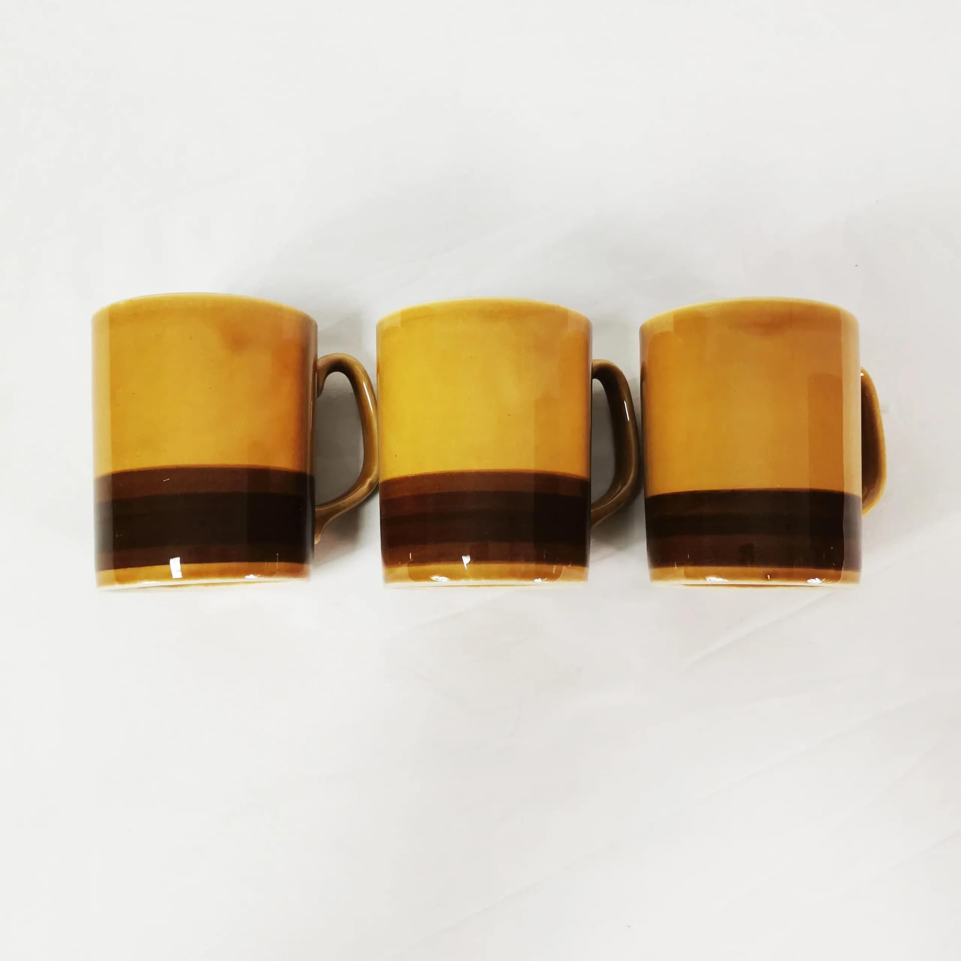 Set of three mugs, brown stoneware, Poland, 1960s. - 338448