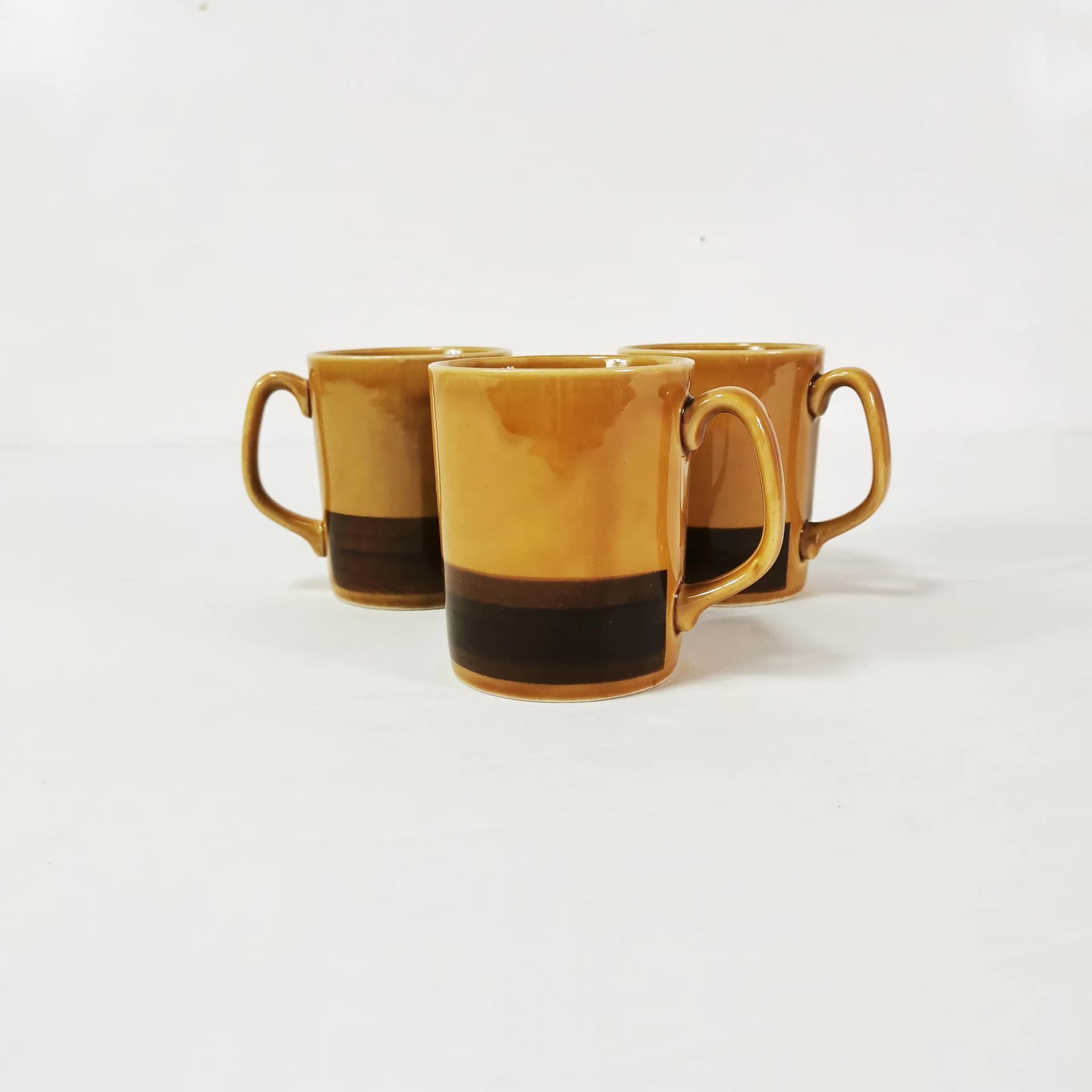 Set of three mugs, brown stoneware, Poland, 1960s. - 338444