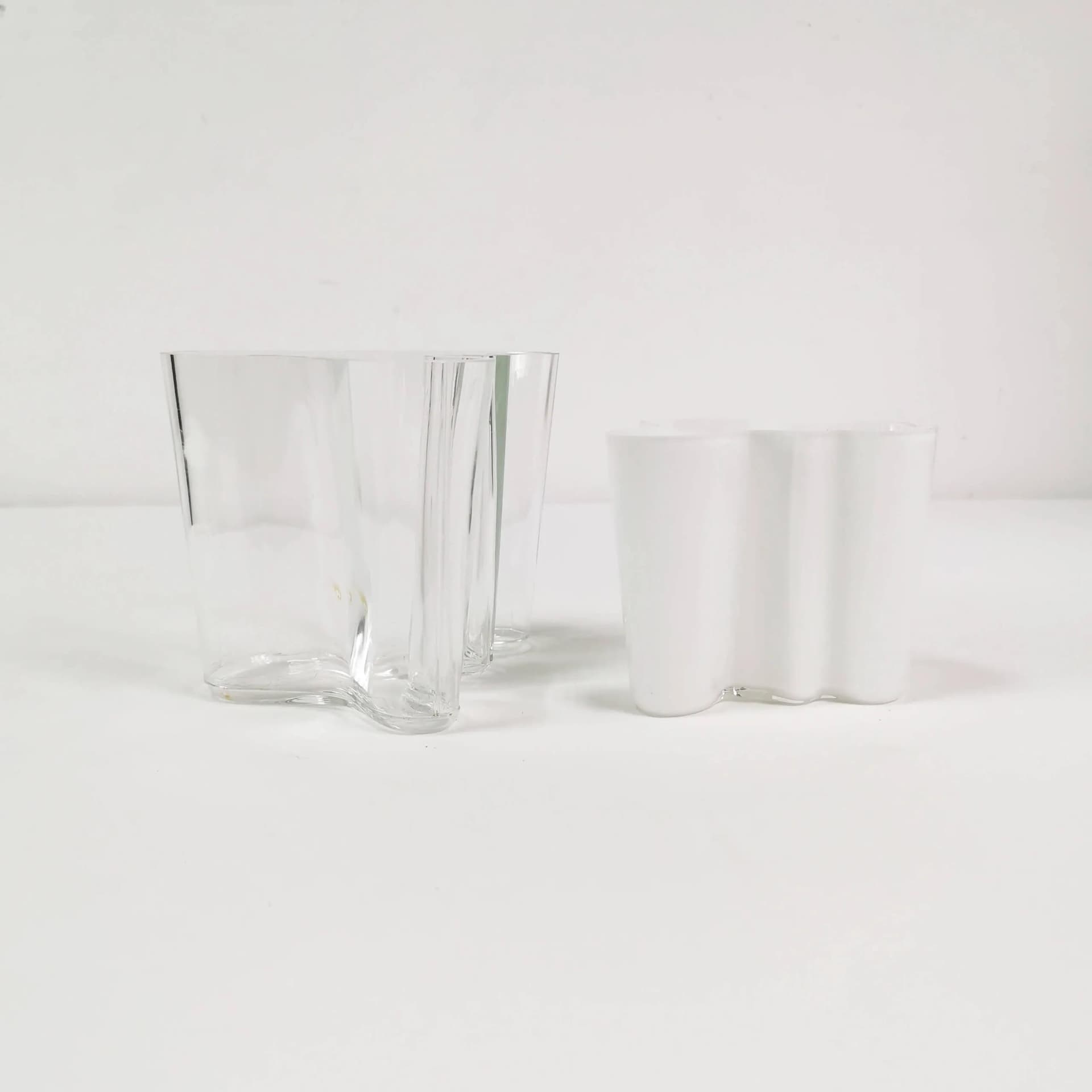 Pair of vases model 3030, transparent glass, white glass, by A. Aalto, Iittala, Finland, 1980s. - 338200