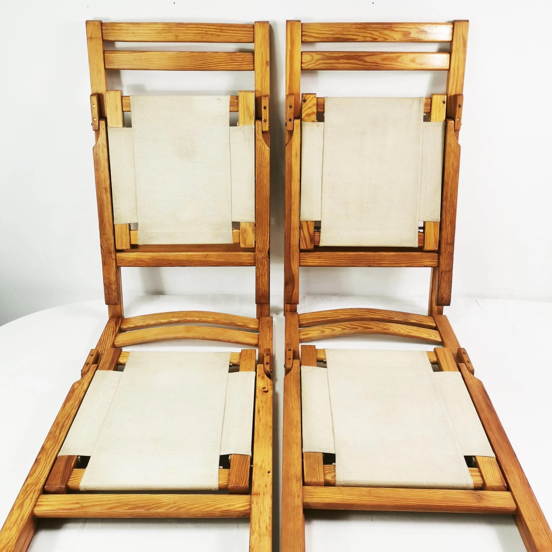 Set of Four Folding Chairs, beige pine, beige canvas, Bialskie Fabryki Mebli Biała Podlaska, Poland, 1970s. - 340879