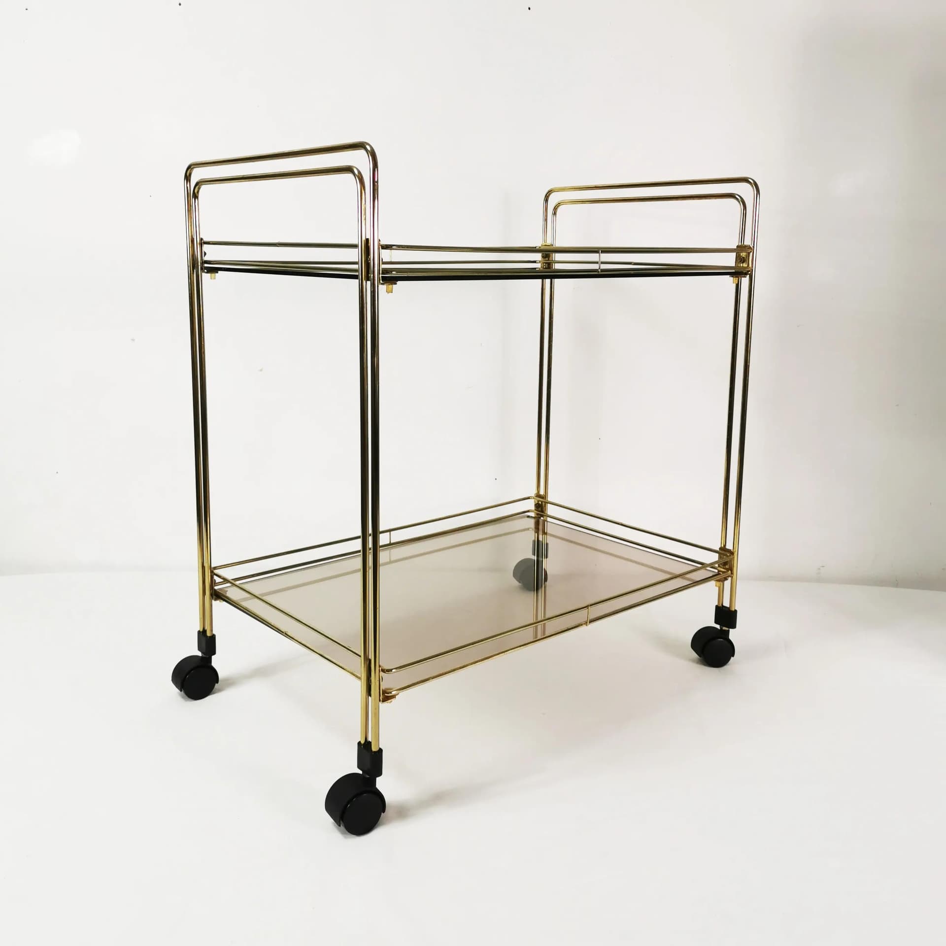 Bar cart minimalist, gold metal, smoked glass, Germany, 1970s. - 340619