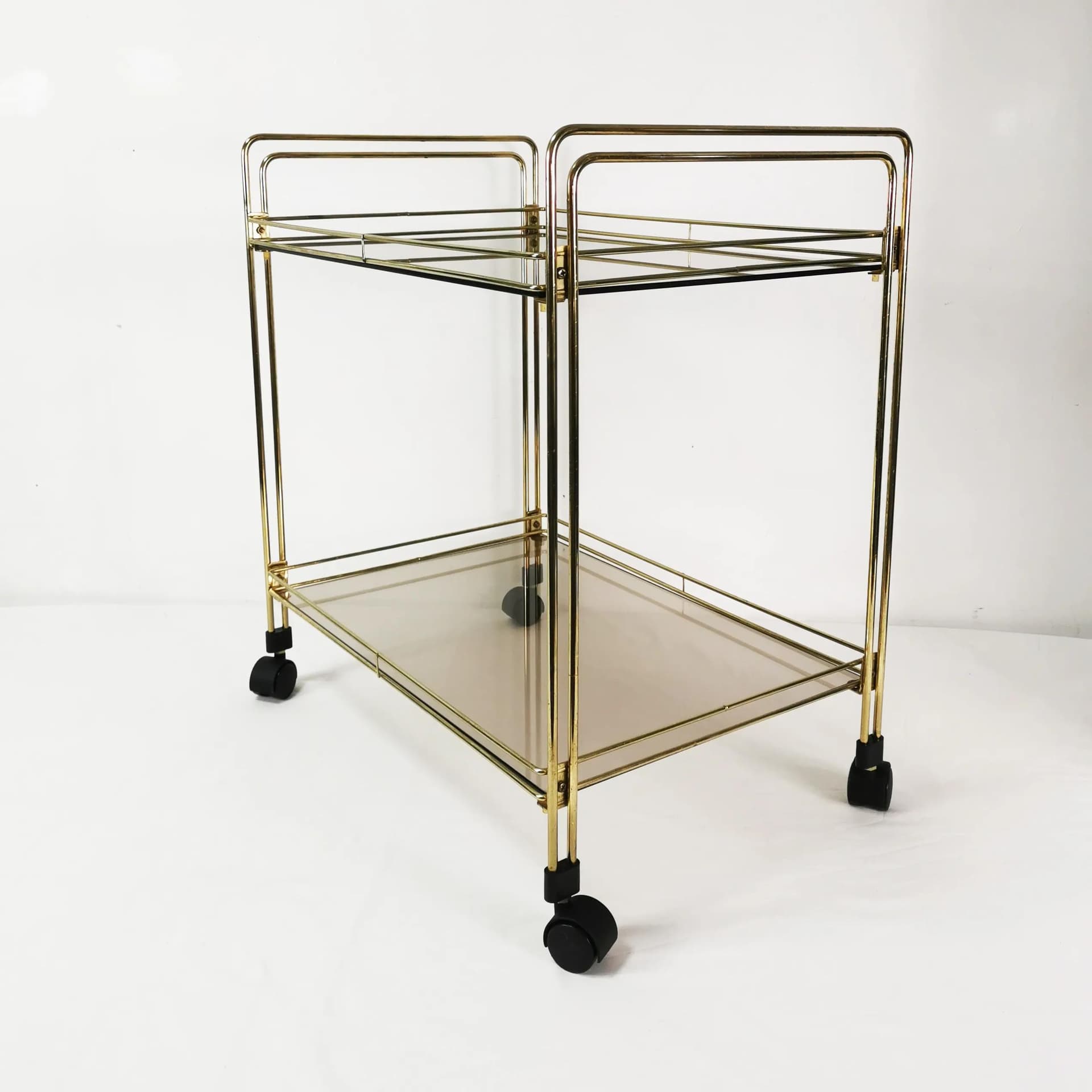 Bar cart minimalist, gold metal, smoked glass, Germany, 1970s. - 340625
