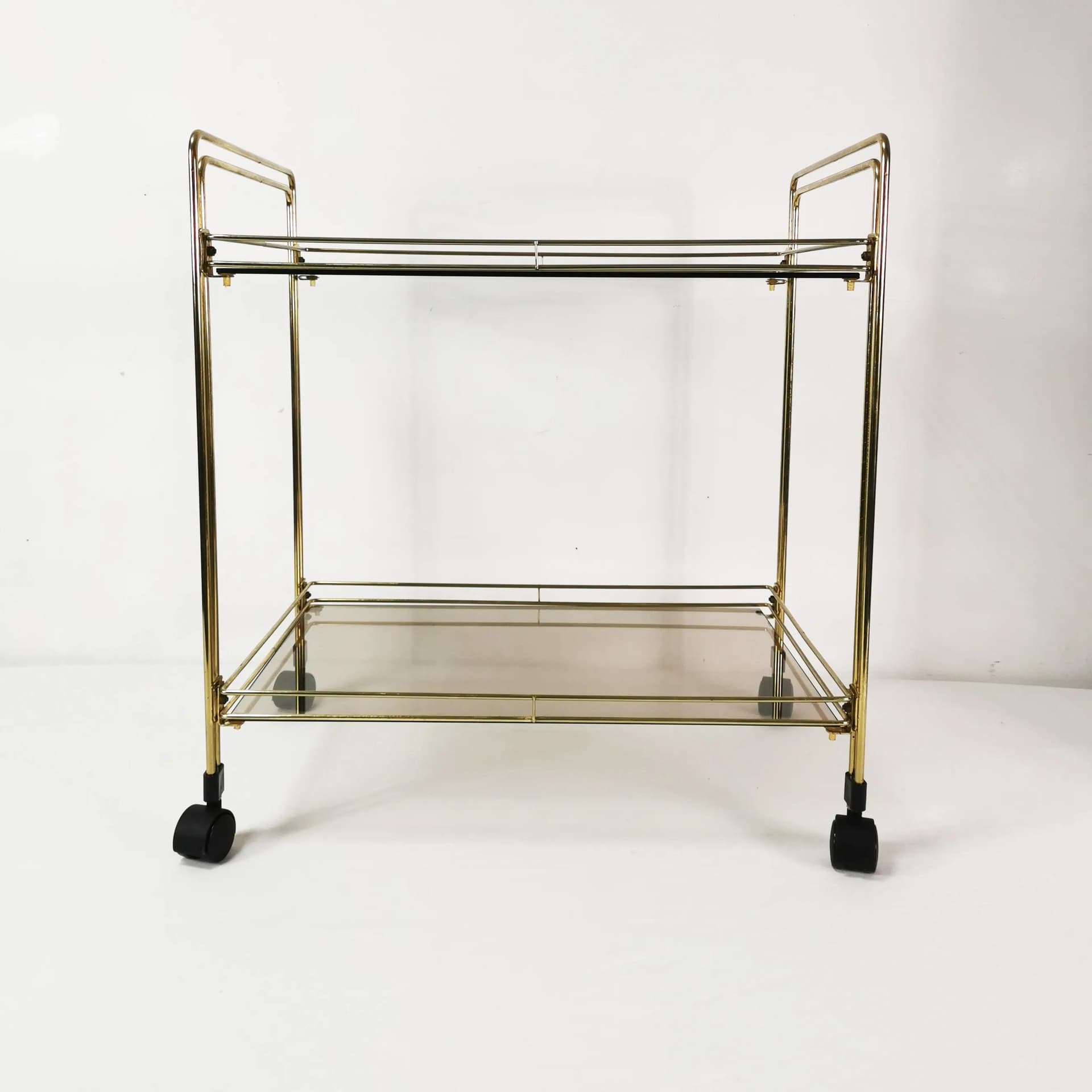 Bar cart minimalist, gold metal, smoked glass, Germany, 1970s. - 340623