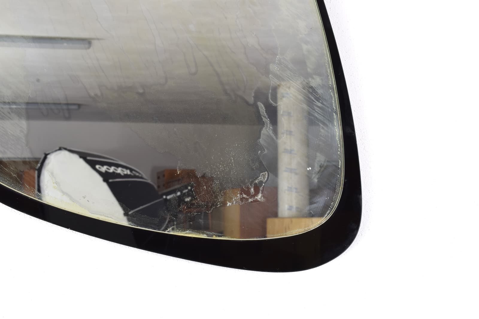 Wall mirror, black glass, Italy, 1960s. - 342009