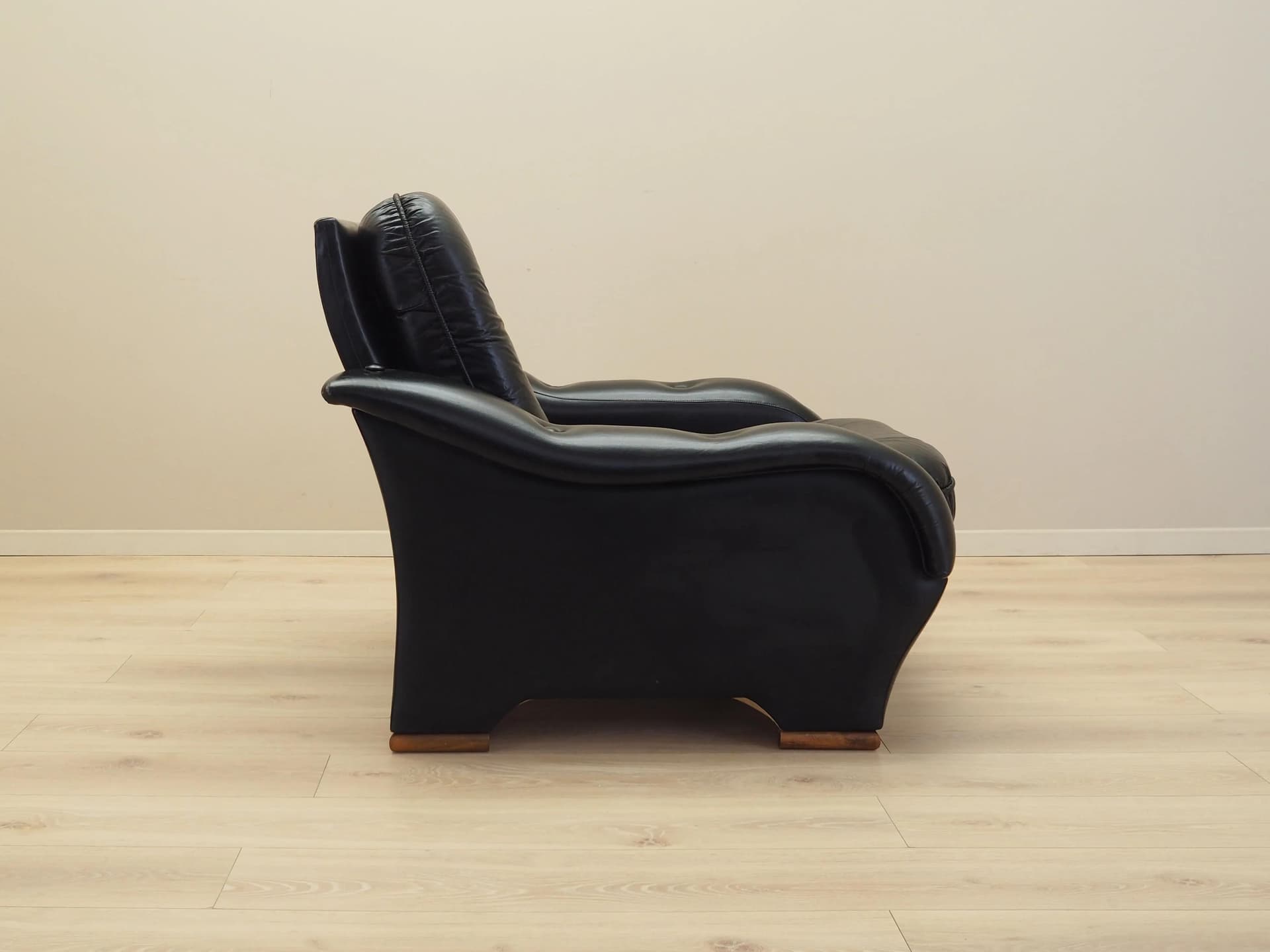 Armchair Postmodern, black artificial leather, dark brown wood, Italy, 1980s. - 25607