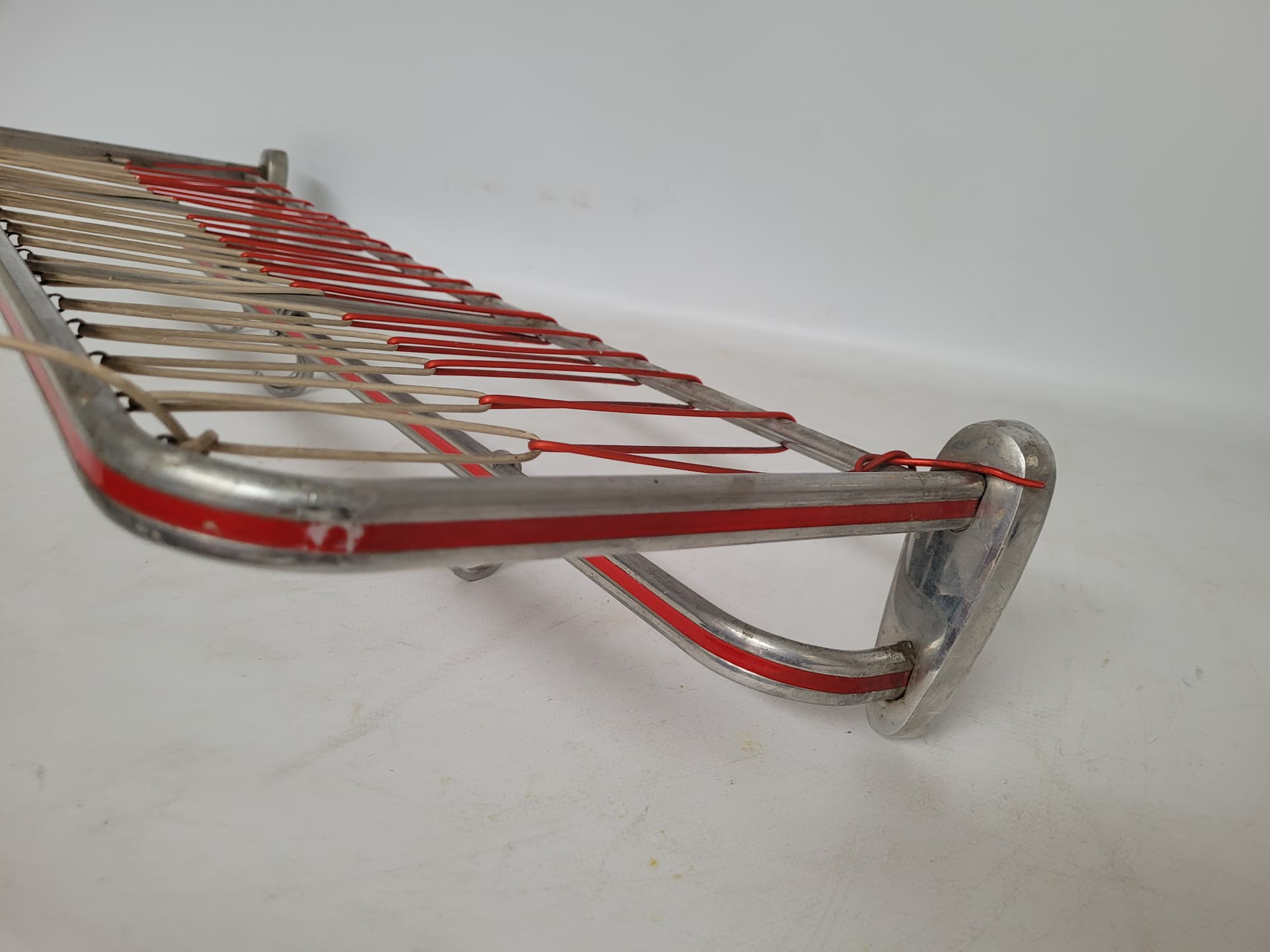 Wall-mounted rack, silver aluminium, red plastic, Germany, 1970s. - 343009