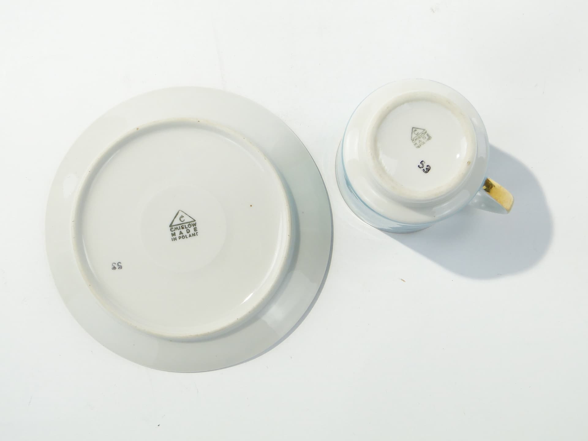 Filiżanka June, porcelana błękitna biała złocona, proj. W. Potacki, Ćmielów, Polska, lata 60. - 343370