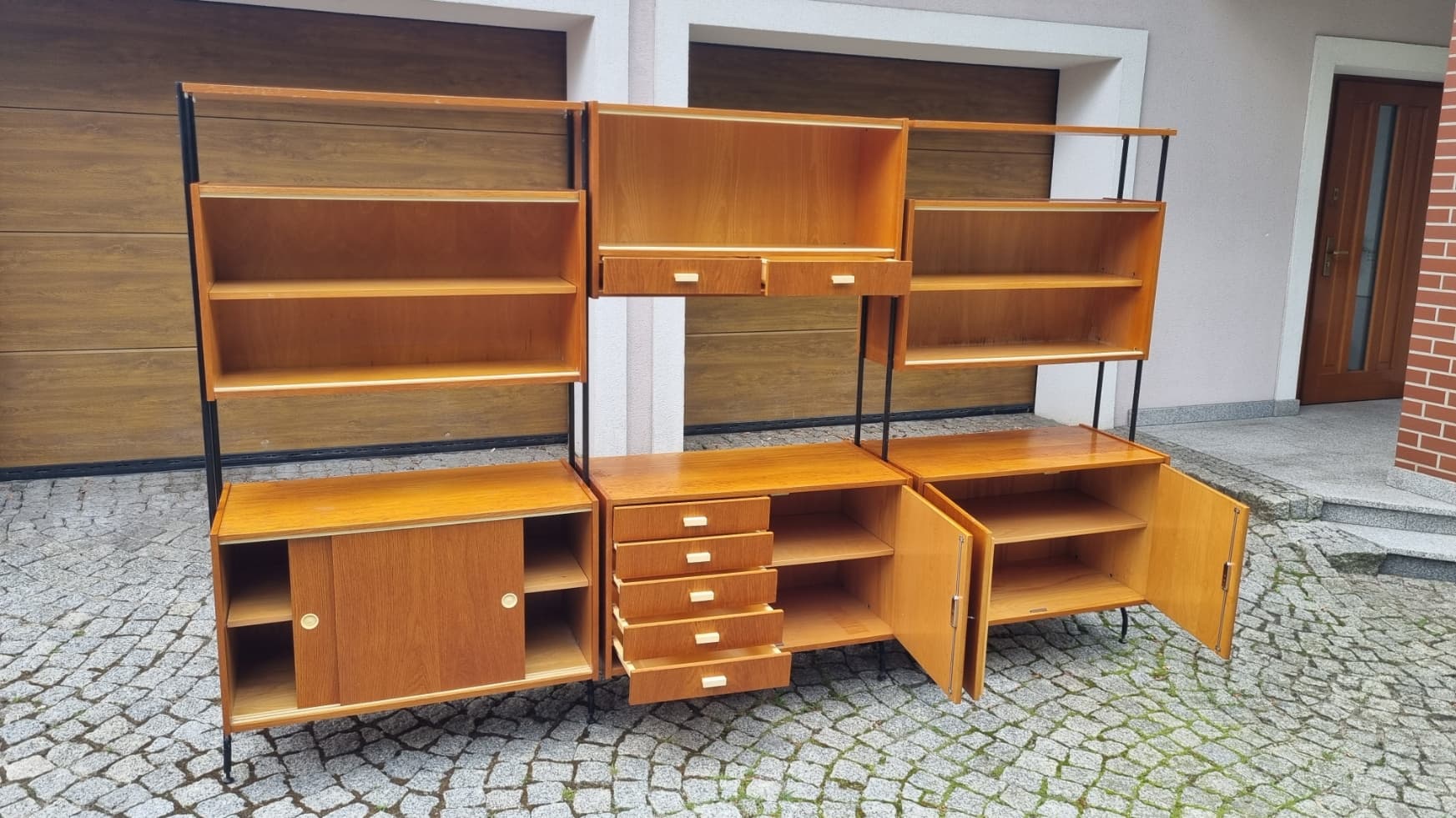 Modular shelving unit, brown wood veneer, black steel, Czechoslovakia, 1960s. - 346209