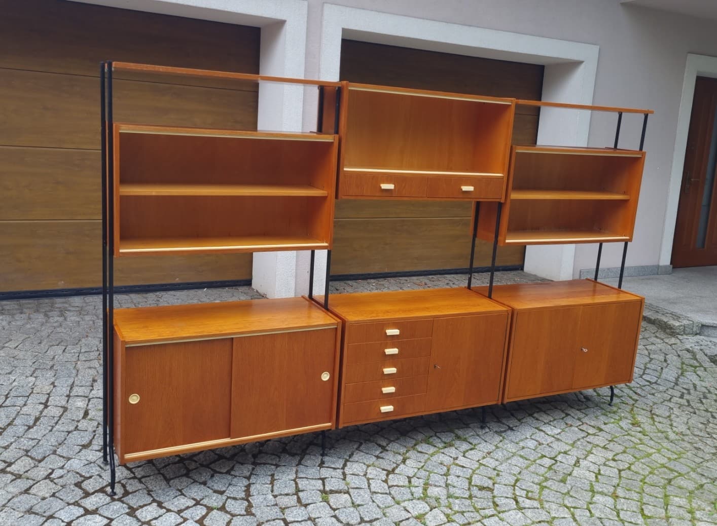 Modular shelving unit, brown wood veneer, black steel, Czechoslovakia, 1960s. - 346207