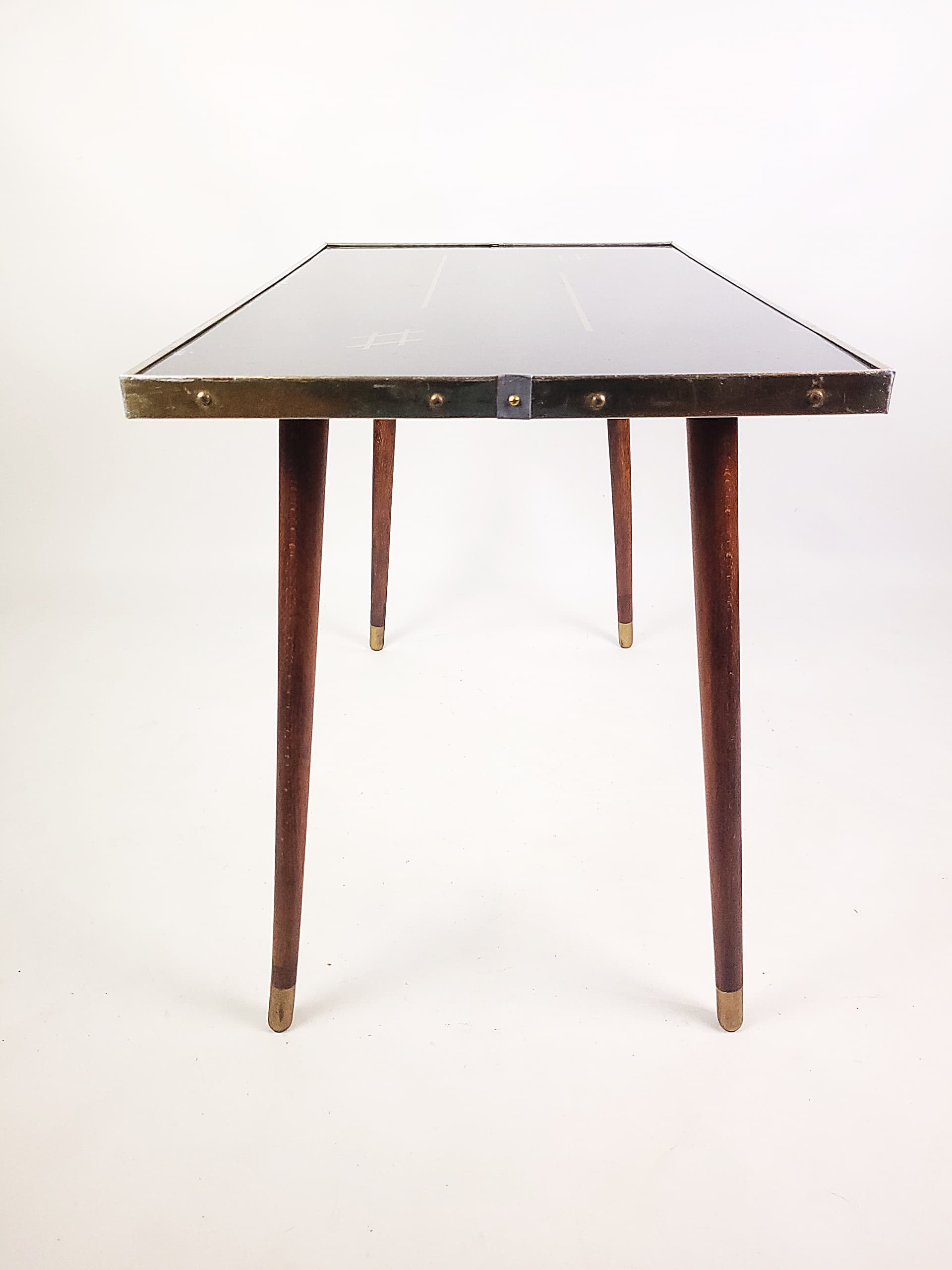 Coffee table, black top, brown wood, gold brass, 1960s. - 346241