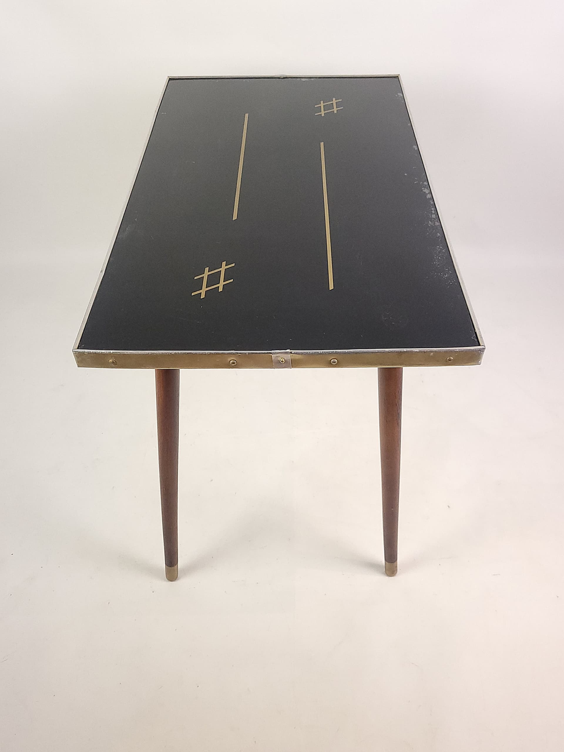Coffee table, black top, brown wood, gold brass, 1960s. - 346242