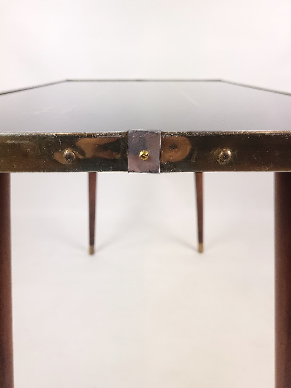Coffee table, black top, brown wood, gold brass, 1960s. - 346235