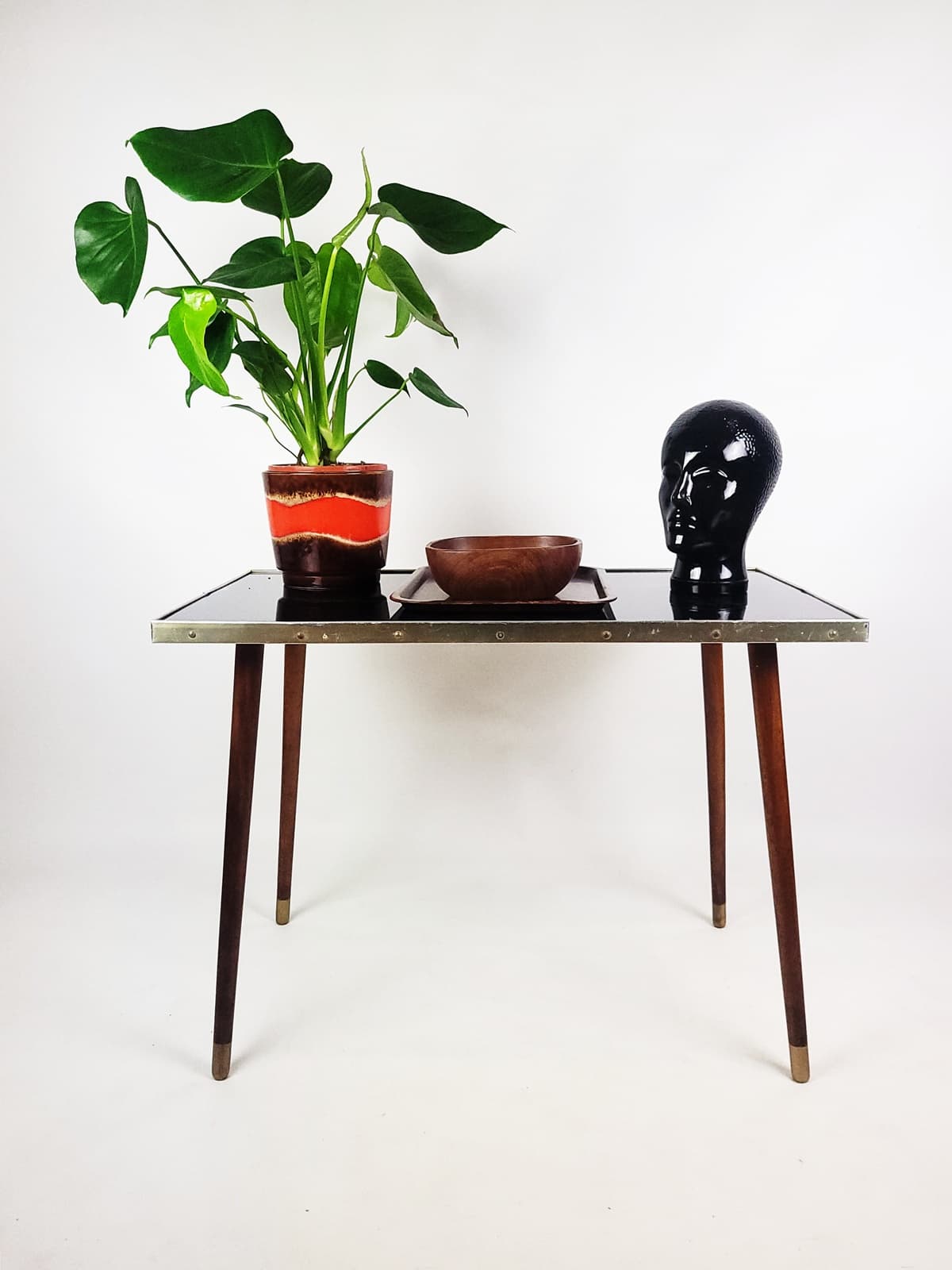 Coffee table, black top, brown wood, gold brass, 1960s. - 346237