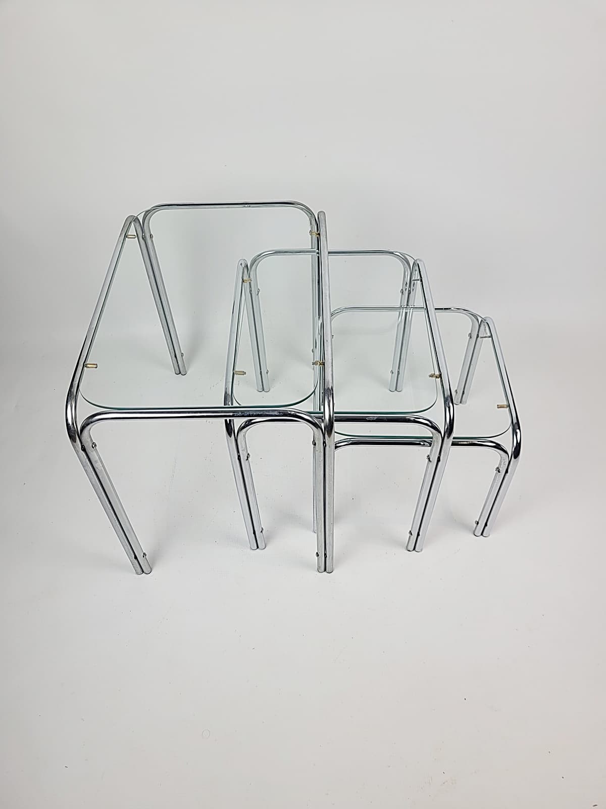 Set of three nesting tables, chromed steel, clear glass, 1970s - 346394