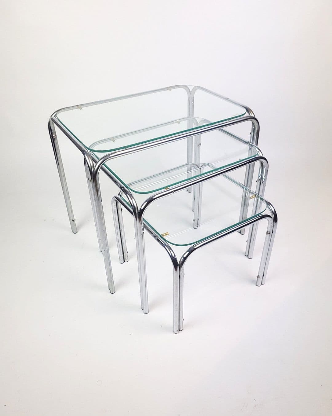 Set of three nesting tables, chromed steel, clear glass, 1970s - 346391