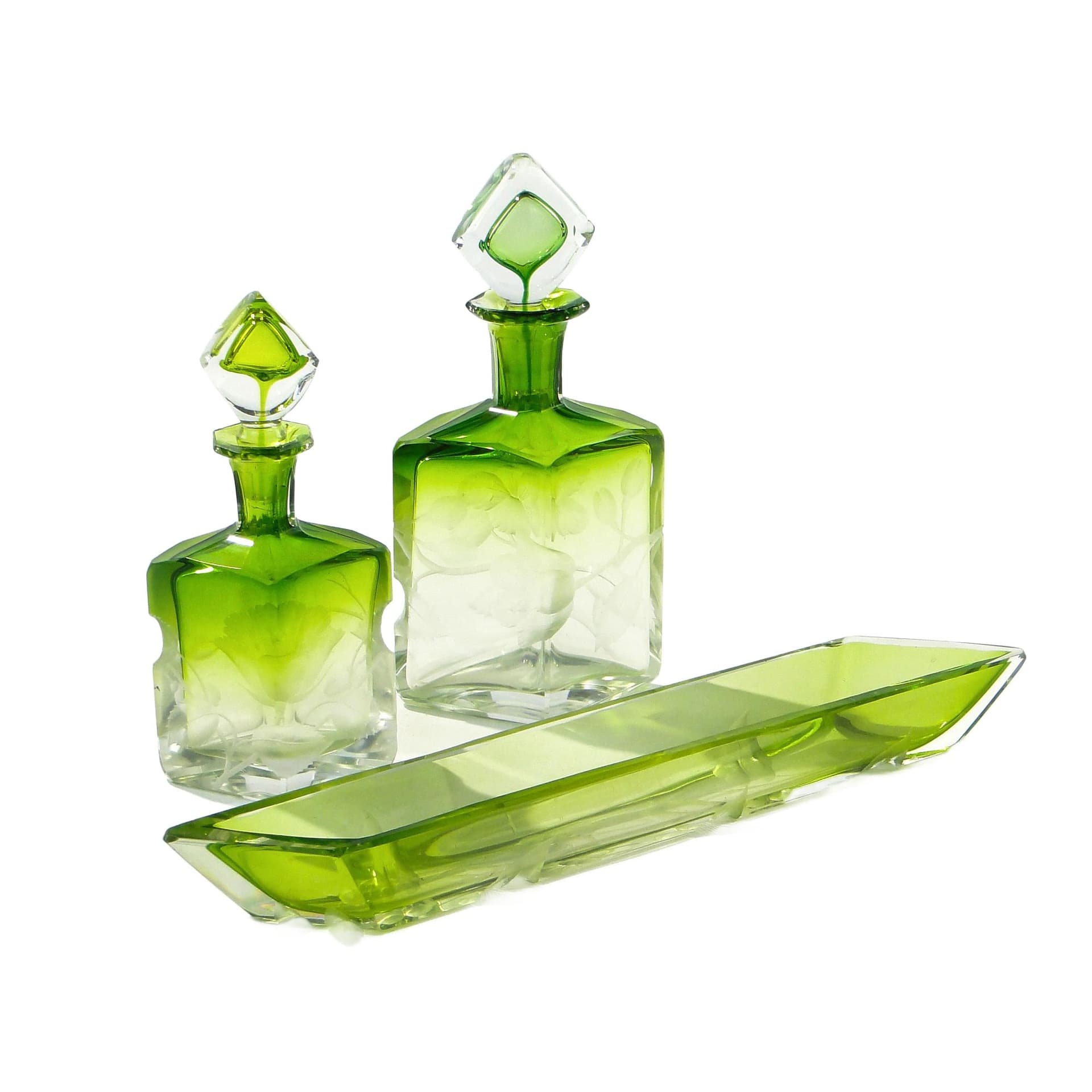 Toilet set Intaglio, emerald green transparent, soda-lime glass, Ludwig Moser & Söhne, Czech Republic, early 20th c.