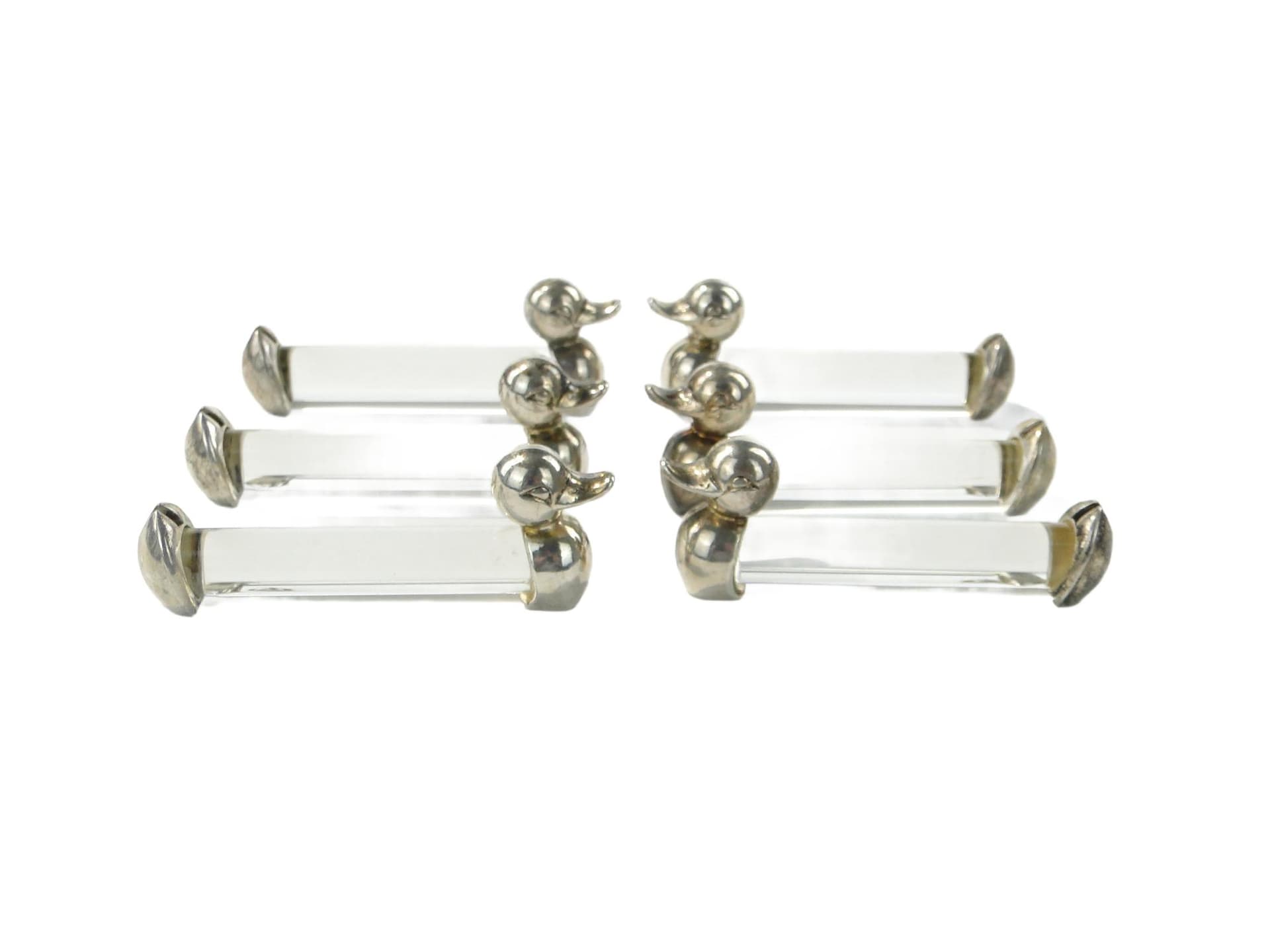 Set of table card holders, figural, transparent crystal, silver metal, France, 1950s