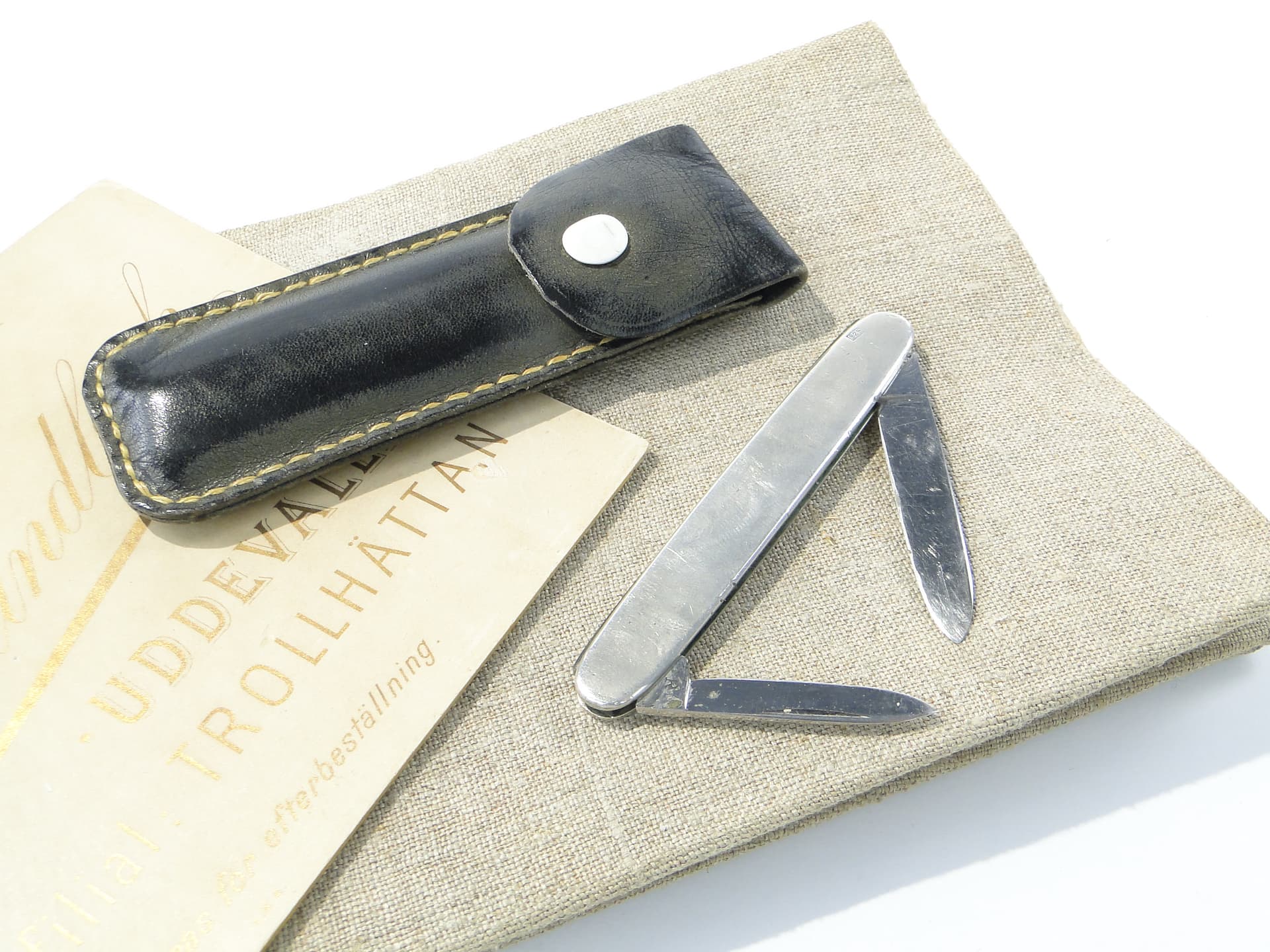 Pocket knife, silver, steel, black leather, United Kingdom, 1960s. - 346765