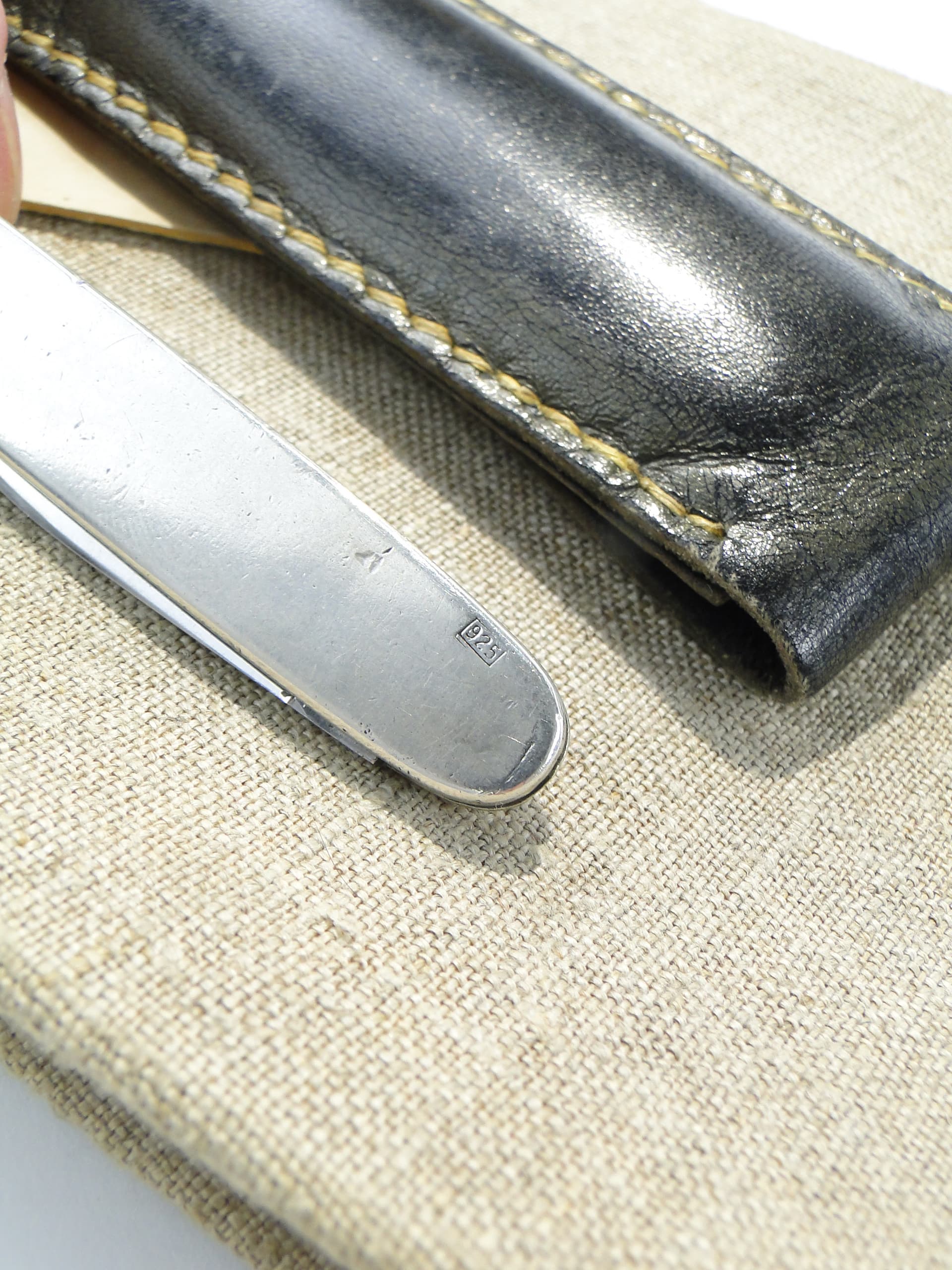 Pocket knife, silver, steel, black leather, United Kingdom, 1960s. - 346762