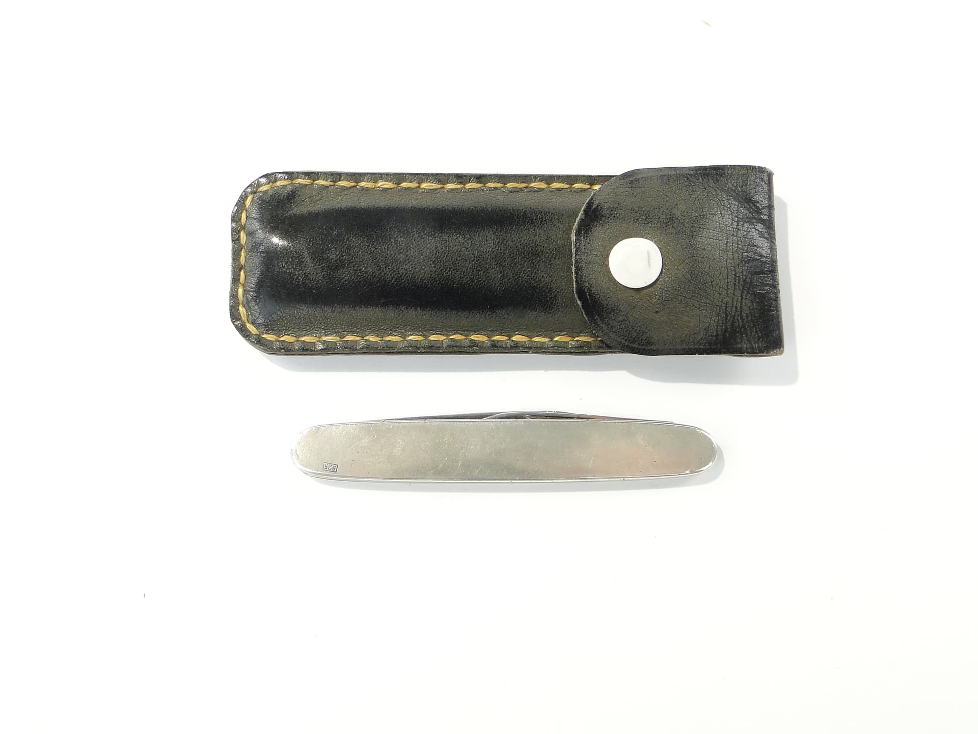 Pocket knife, silver, steel, black leather, United Kingdom, 1960s. - 346758
