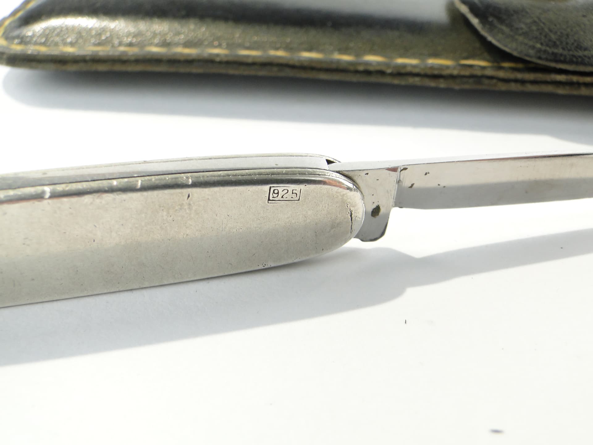 Pocket knife, silver, steel, black leather, United Kingdom, 1960s. - 346756