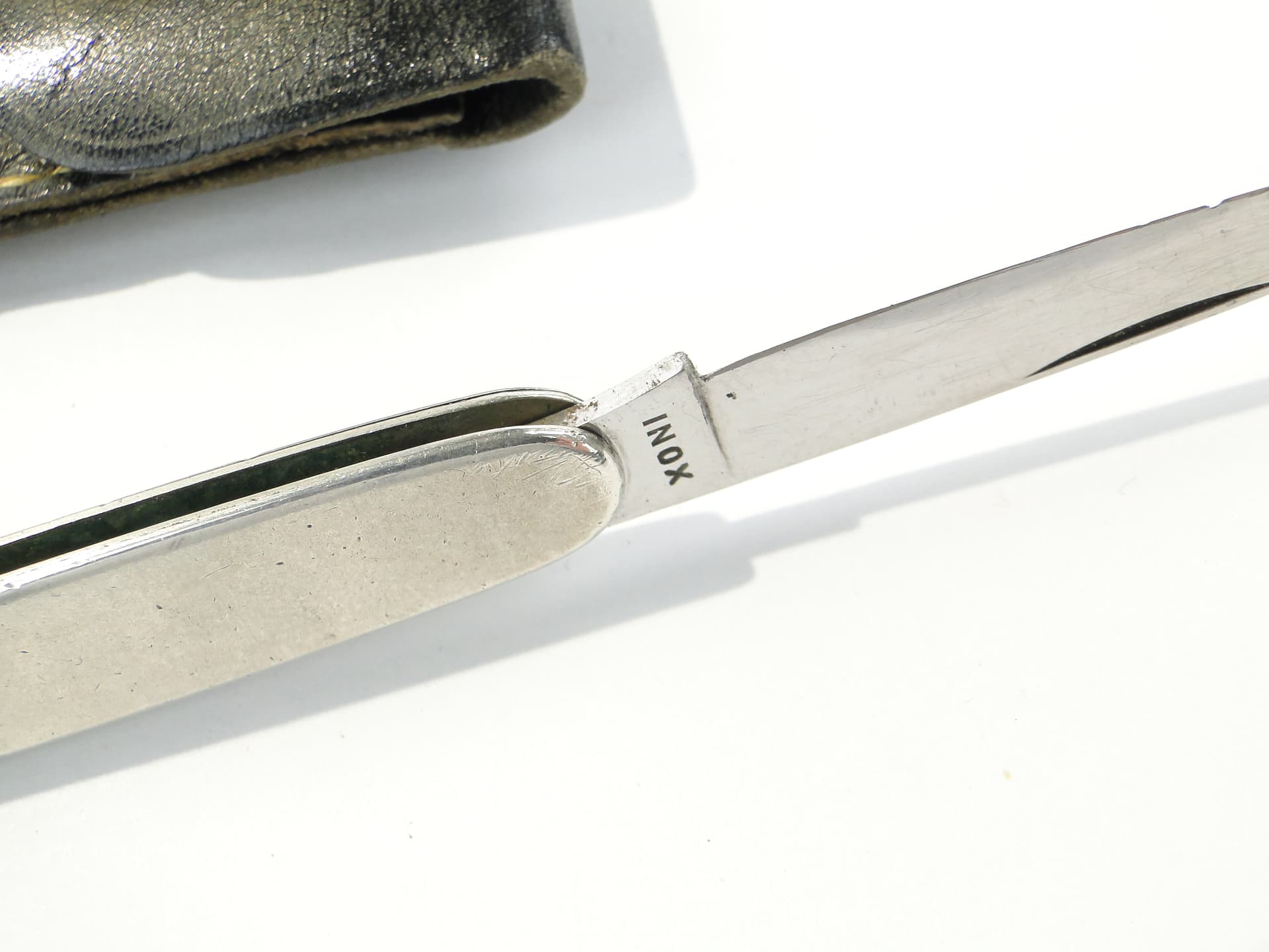 Pocket knife, silver, steel, black leather, United Kingdom, 1960s. - 346760