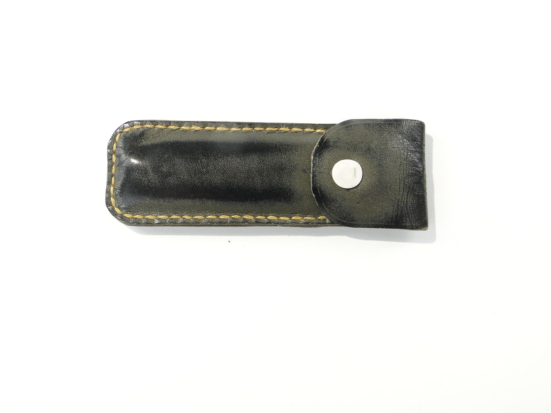 Pocket knife, silver, steel, black leather, United Kingdom, 1960s. - 346757