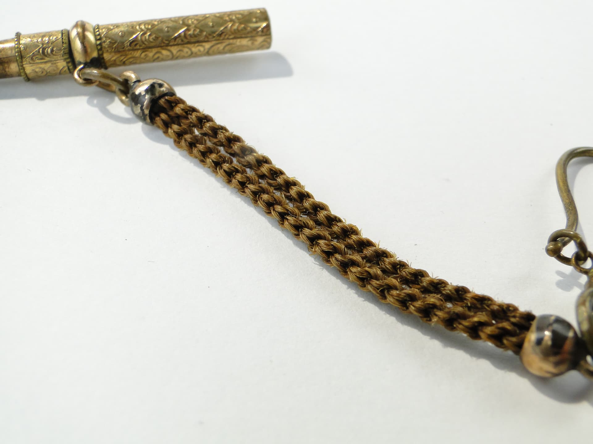 Pocket watch key with fob, gilt brass, human hair, Europe, 19th century - 346816
