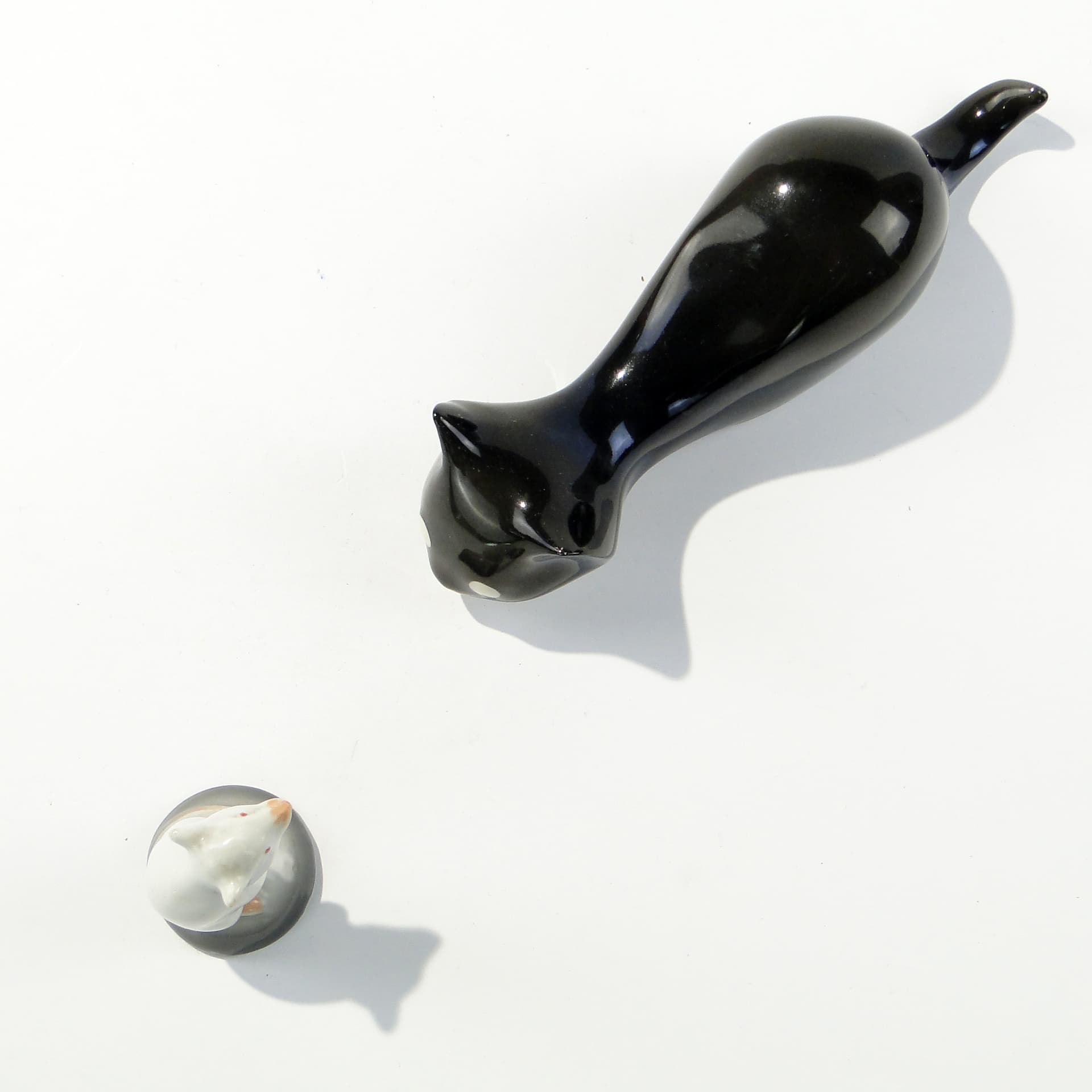 Figurine Crouching Cat, black, porcelain, Chodzież, Poland, 1960s - 347283