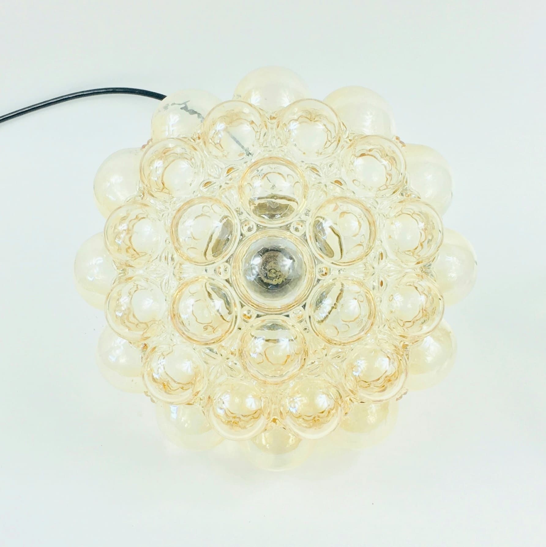 Ceiling lamp Bubble, light amber glass, brass, by H. Tynell, Limburg, Germany, 1970s. - 347426