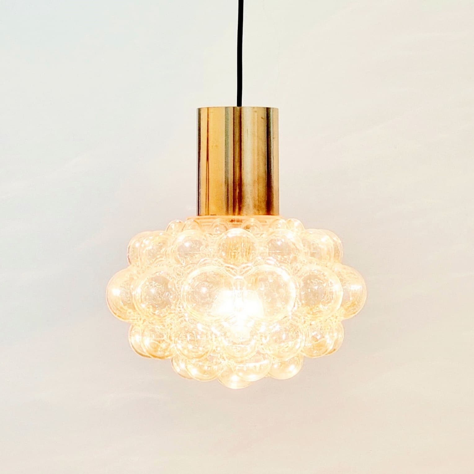 Ceiling lamp Bubble, light amber glass, brass, by H. Tynell, Limburg, Germany, 1970s. - 347423