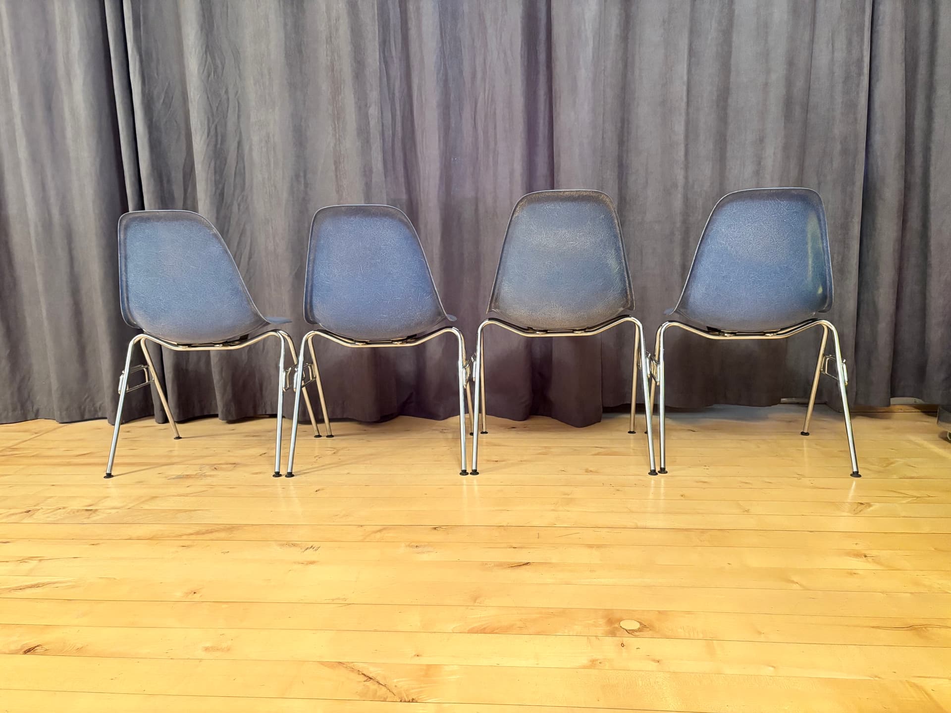 Set of four DSS chairs, blue fiberglass, silver chrome, by C. & R. Eames, Herman Miller, USA, 1970s. - 347900