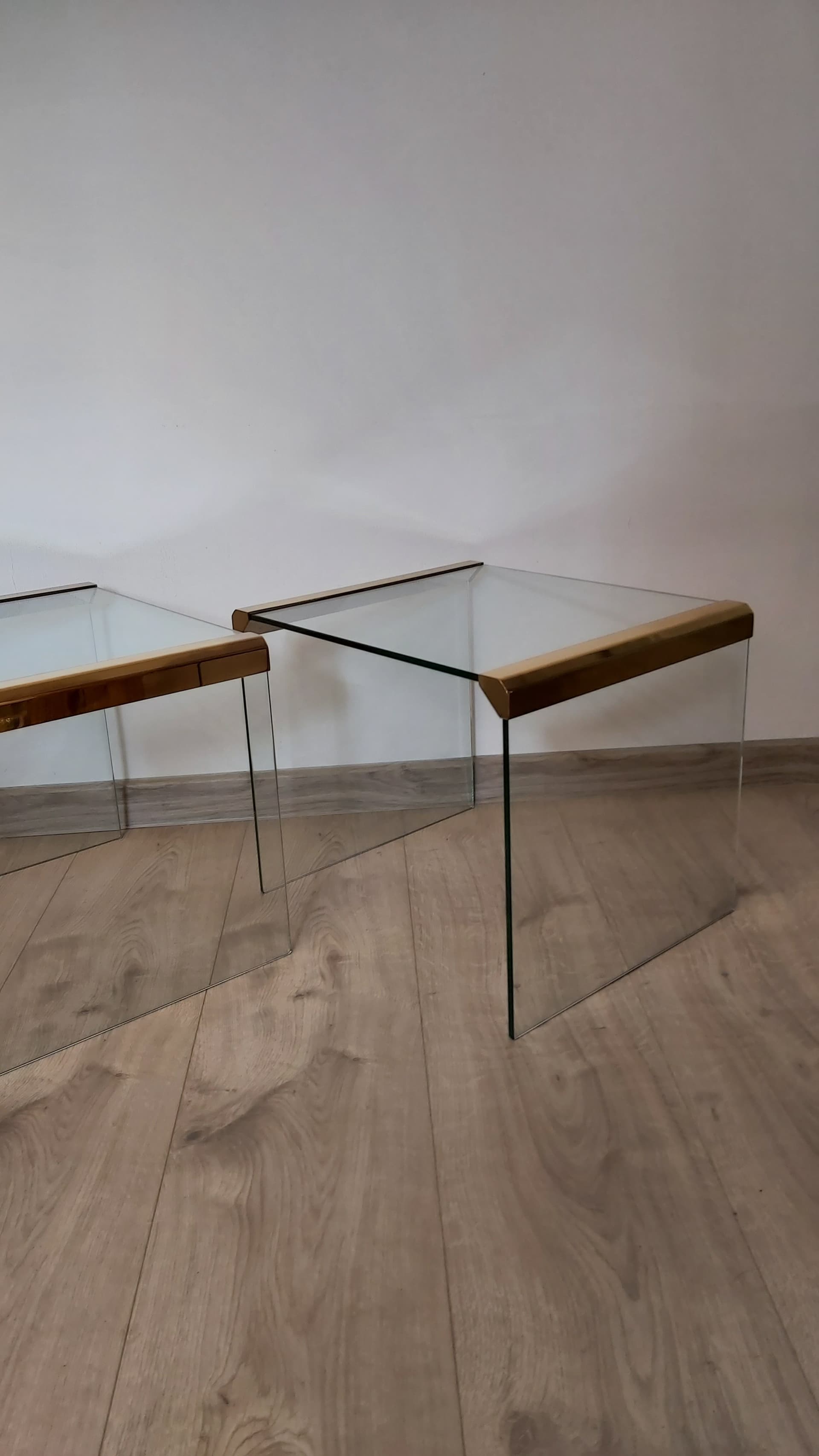 Pair of side tables, transparent greenish glass, gold brass, Italy, 1970s. - 349408