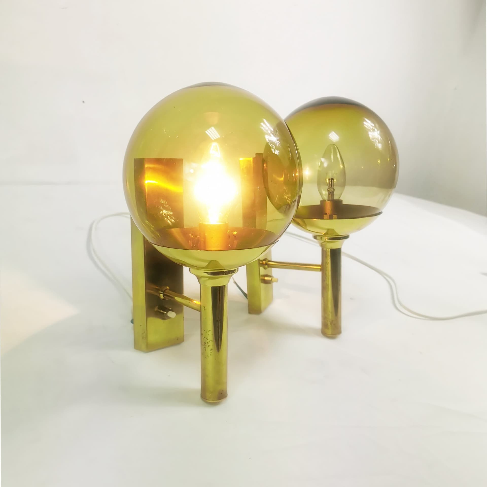 Pair of wall sconces Mid Century, gold brass, smoked glass, by Sv. Mejlstrøm, Mejlstrøm Belysning, Norway, 1960s. - 349713