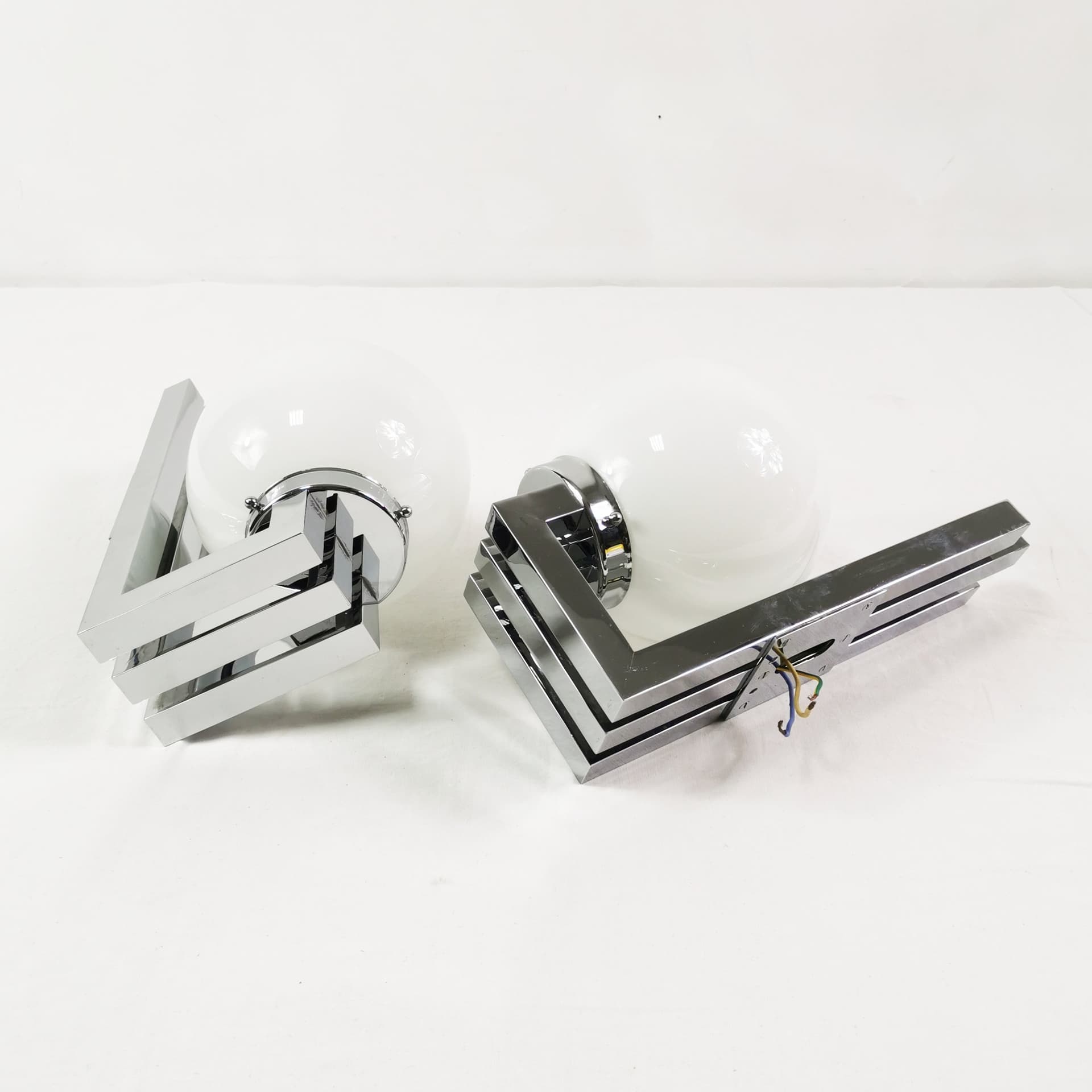 Pair of wall sconces Bauhaus-Modern, silver chrome, white glass, by T. Wien, Austria, 1970s. - 349797