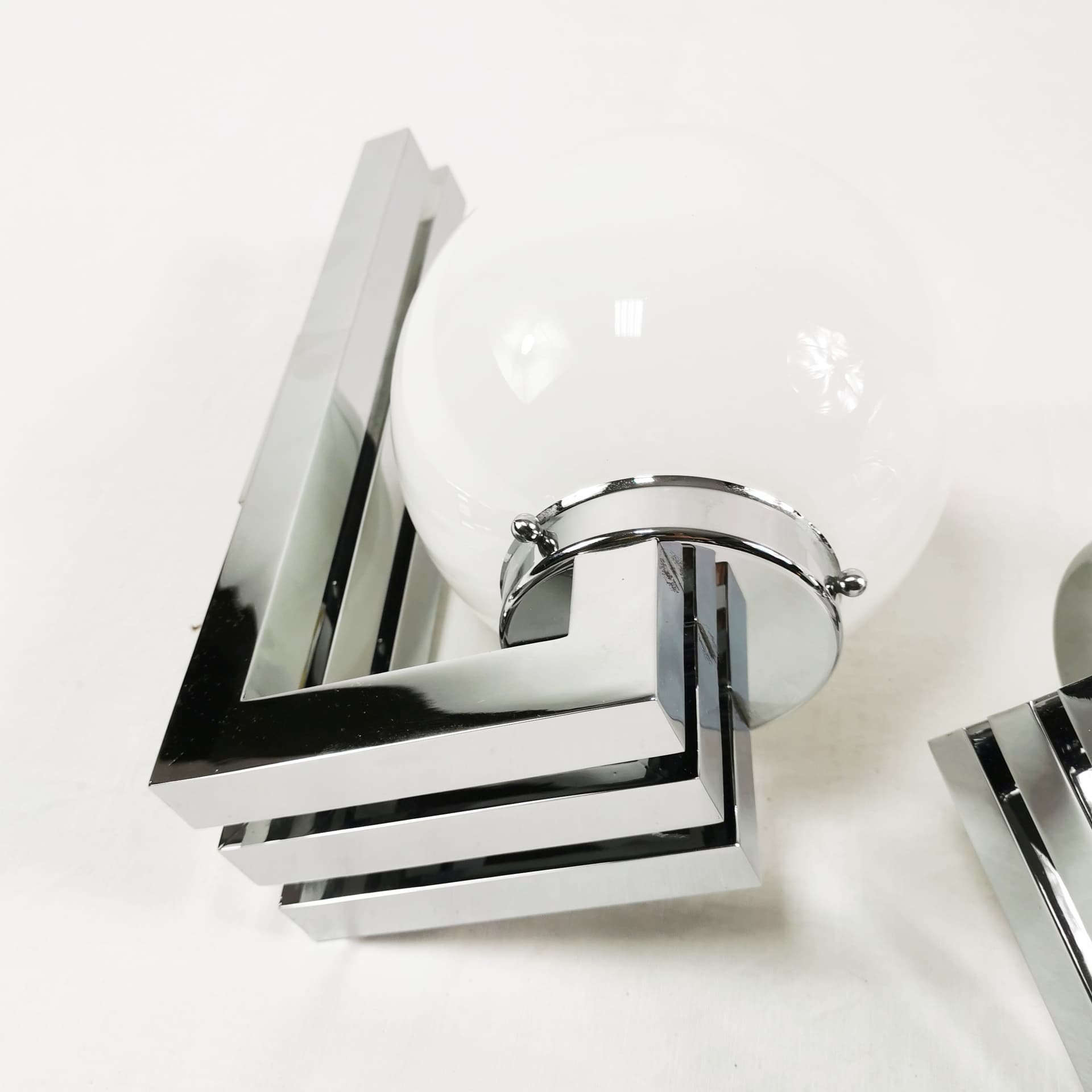 Pair of wall sconces Bauhaus-Modern, silver chrome, white glass, by T. Wien, Austria, 1970s. - 349798