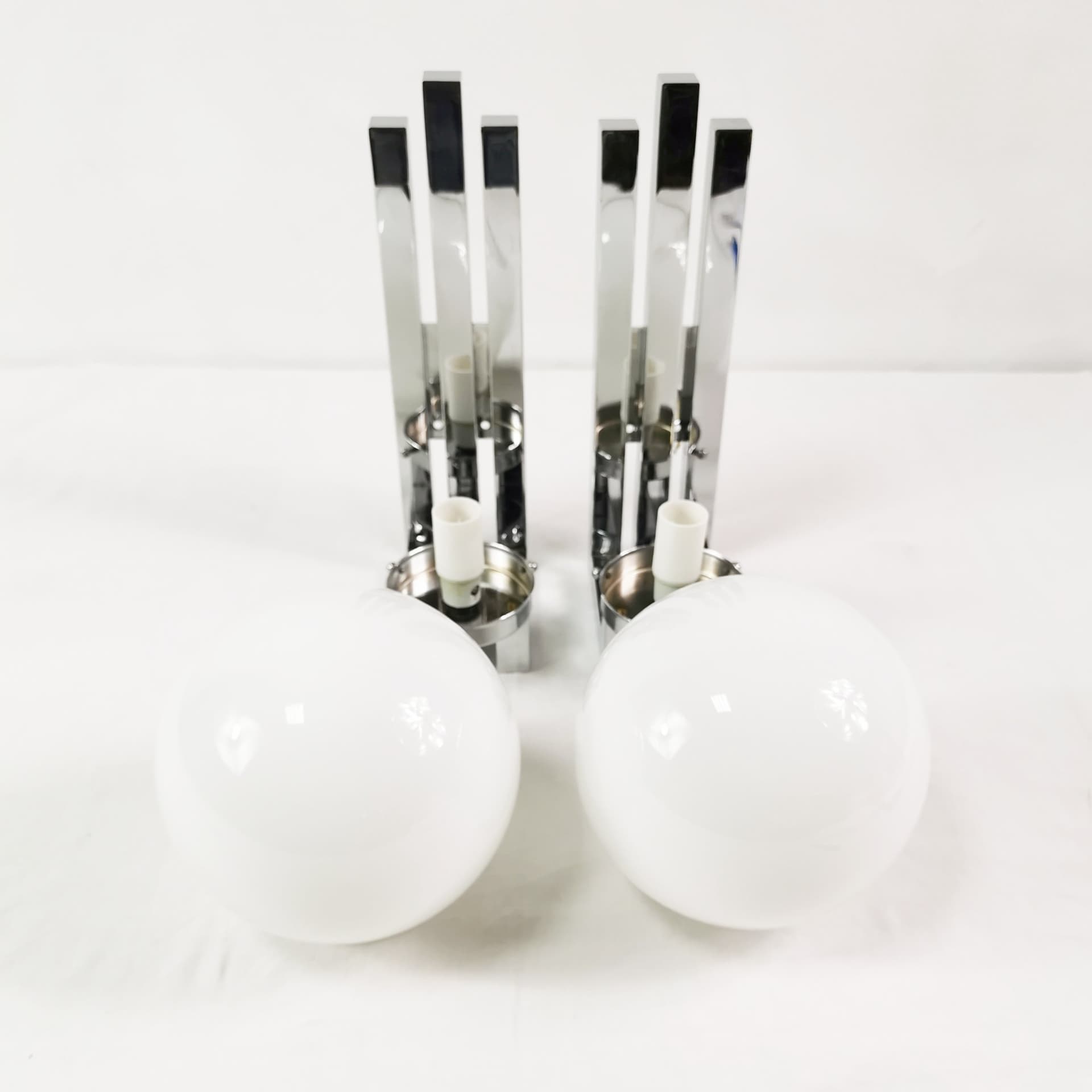 Pair of wall sconces Bauhaus-Modern, silver chrome, white glass, by T. Wien, Austria, 1970s. - 349802