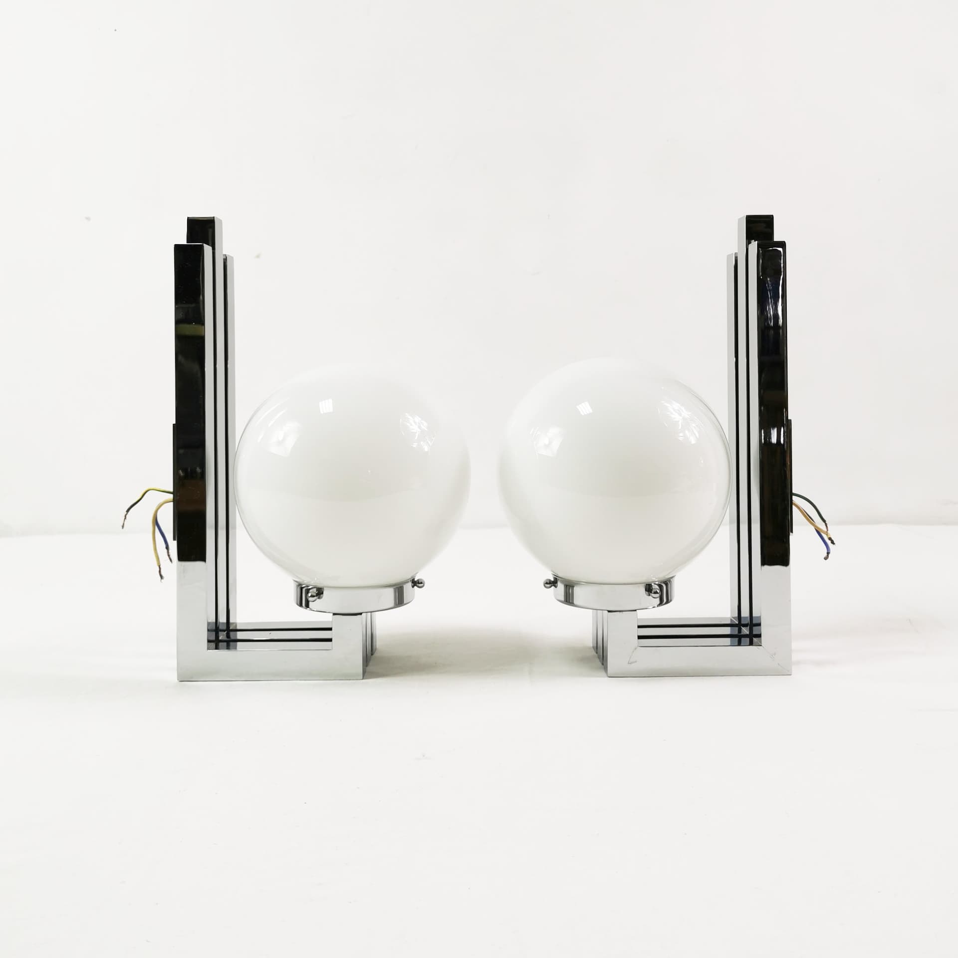 Pair of wall sconces Bauhaus-Modern, silver chrome, white glass, by T. Wien, Austria, 1970s. - 349794