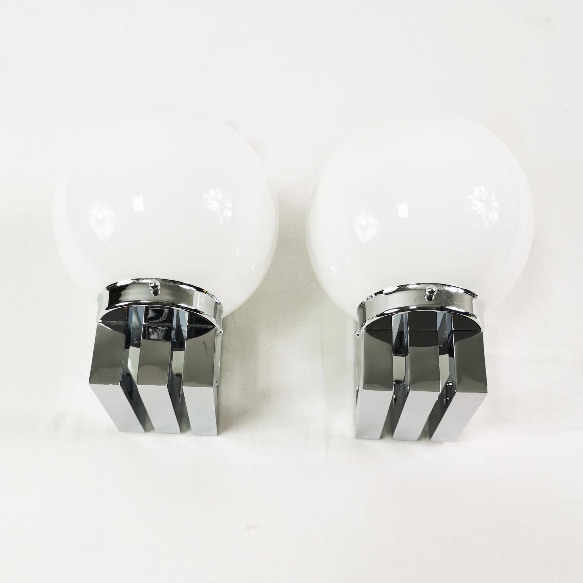 Pair of wall sconces Bauhaus-Modern, silver chrome, white glass, by T. Wien, Austria, 1970s. - 349800