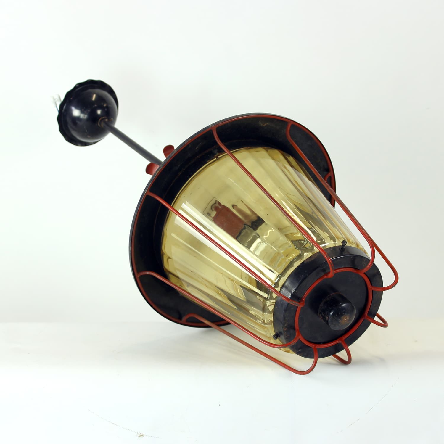 Railway pendant lamp, black steel, red glass, Czechoslovakia, 1940s. - 350901
