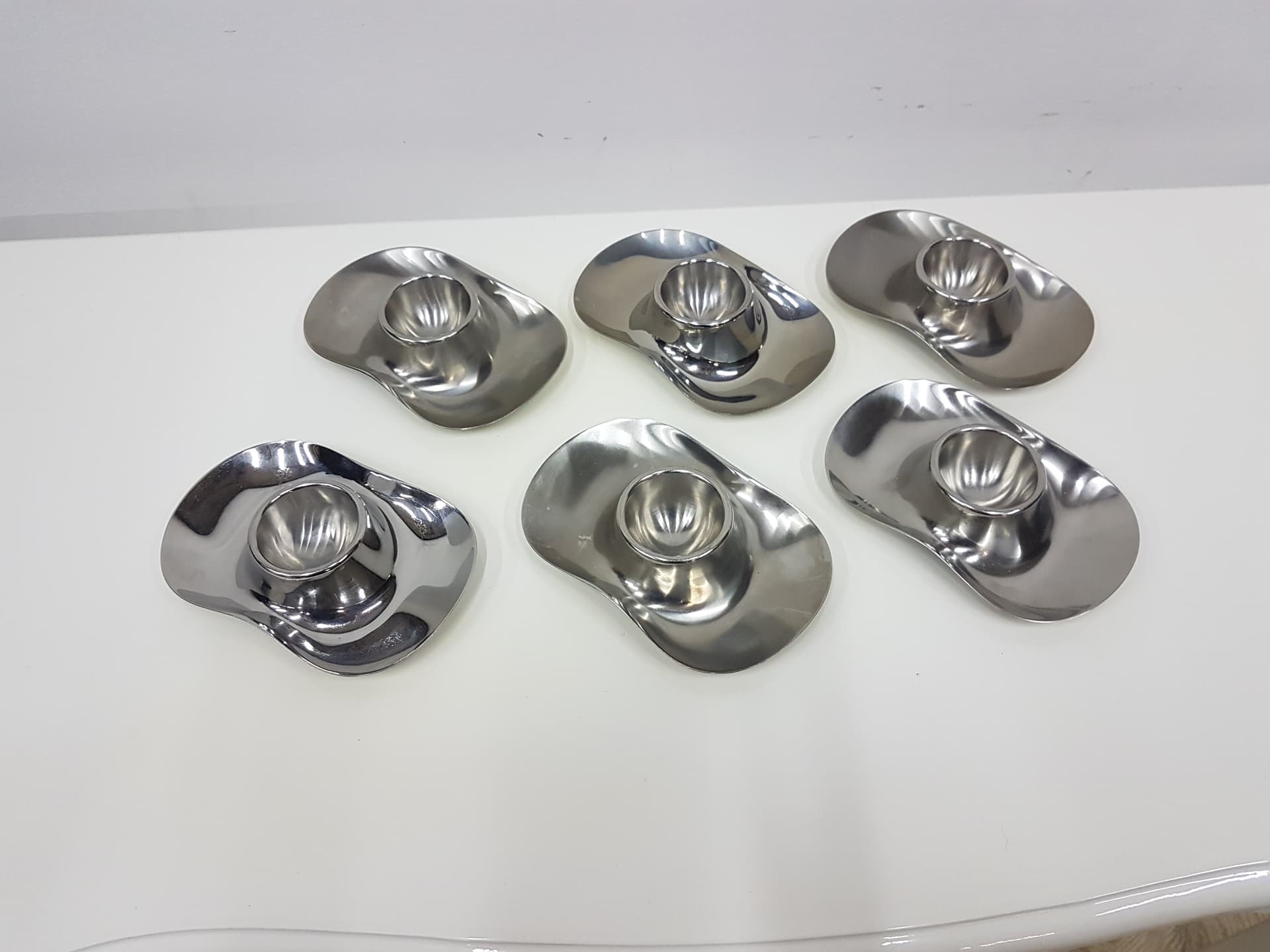 Set of six egg holders, silver stainless steel, by W. Wagenfeld, WMF, Germany, 1960s. - 351991