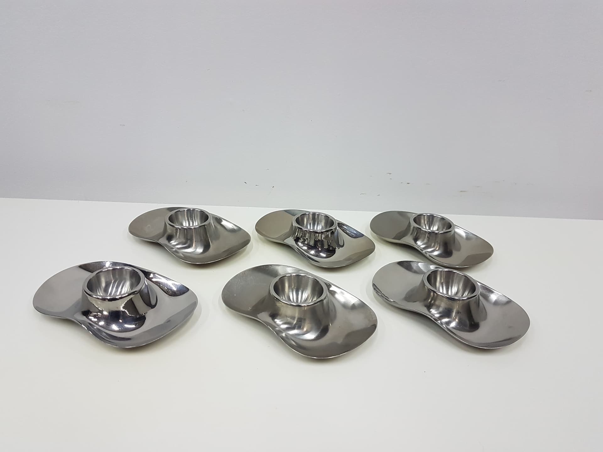 Set of six egg holders, silver stainless steel, by W. Wagenfeld, WMF, Germany, 1960s. - 351987