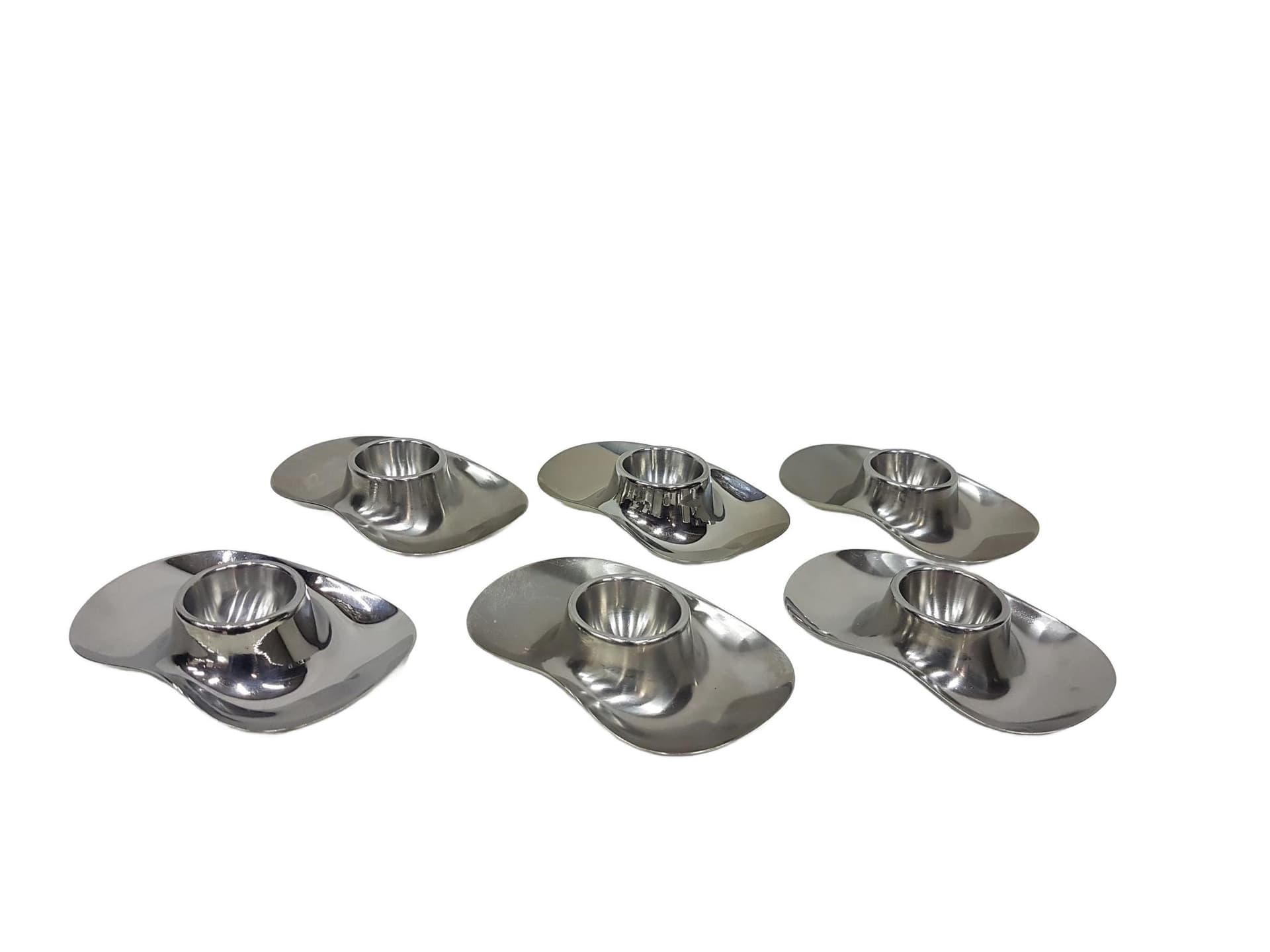 Set of six egg holders, silver stainless steel, by W. Wagenfeld, WMF, Germany, 1960s.