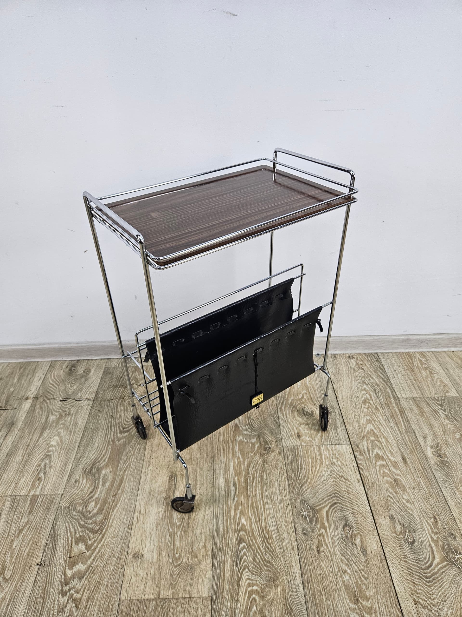 Bar trolley with magazine rack, brown laminated top, chrome steel, black faux leather, Germany, 1960s. - 352111