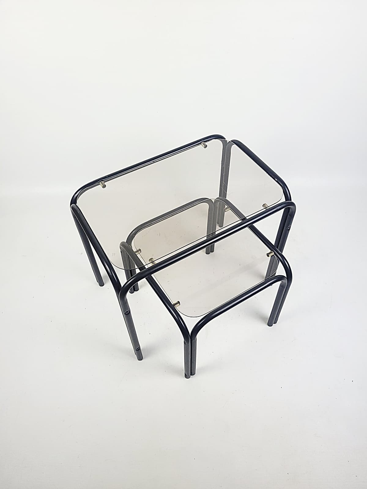 Set of two coffee tables, grey glass, black metal, 1980s. - 352775