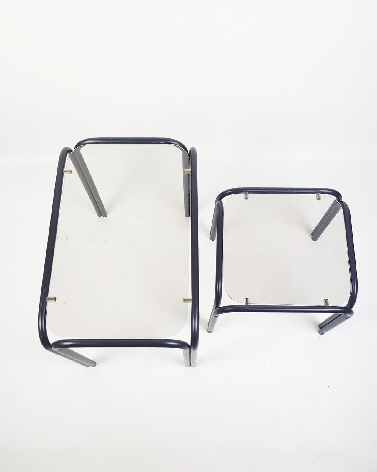 Set of two coffee tables, grey glass, black metal, 1980s. - 352772