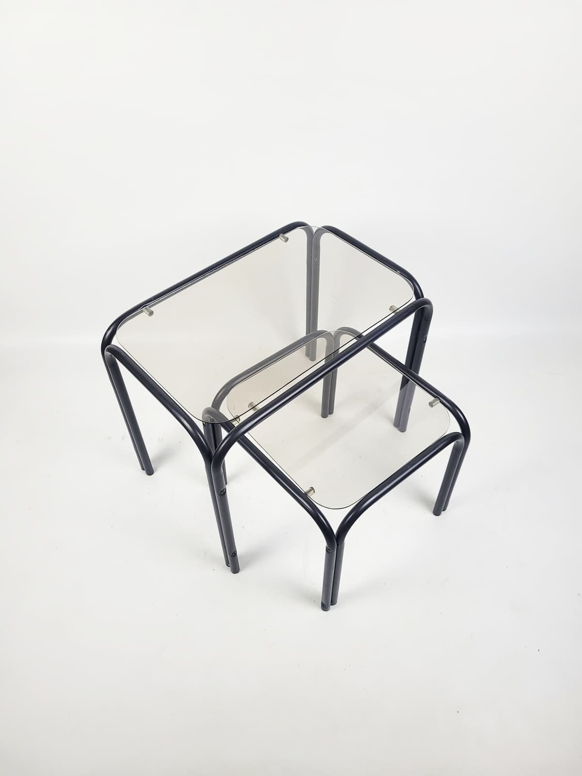 Set of two coffee tables, grey glass, black metal, 1980s. - 352770