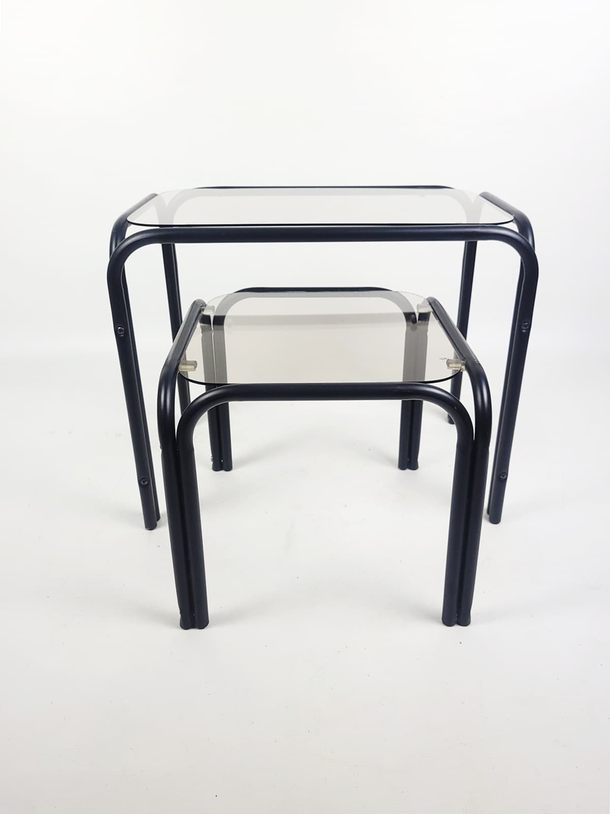 Set of two coffee tables, grey glass, black metal, 1980s. - 352773